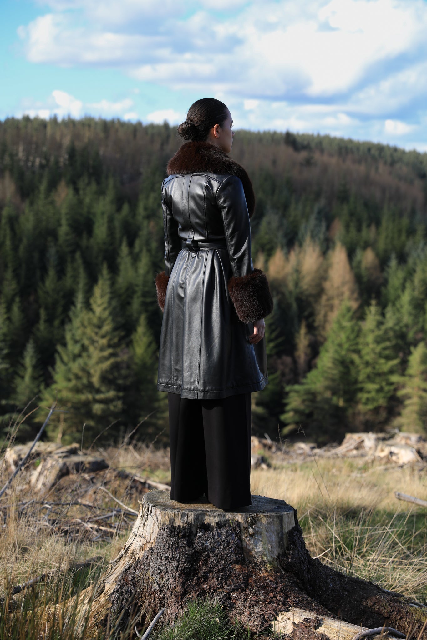 Josephine Jones genuine leather black trench coat with chocolate faux fur collar and cuffs - a timeless statement piece for any wardrobe.