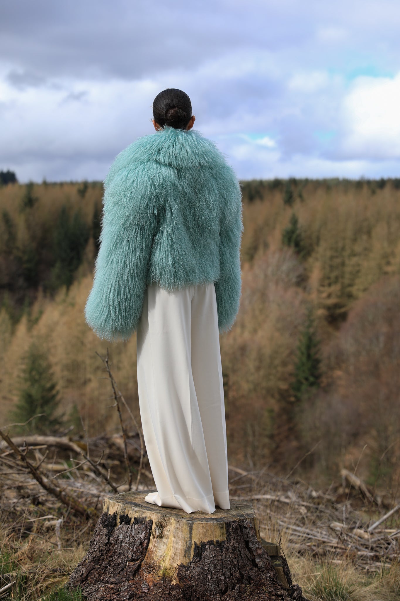 Josephine Jones' iconic mint voluminous collar Mongolian fur coat, a classic staple piece for luxurious winter fashion.