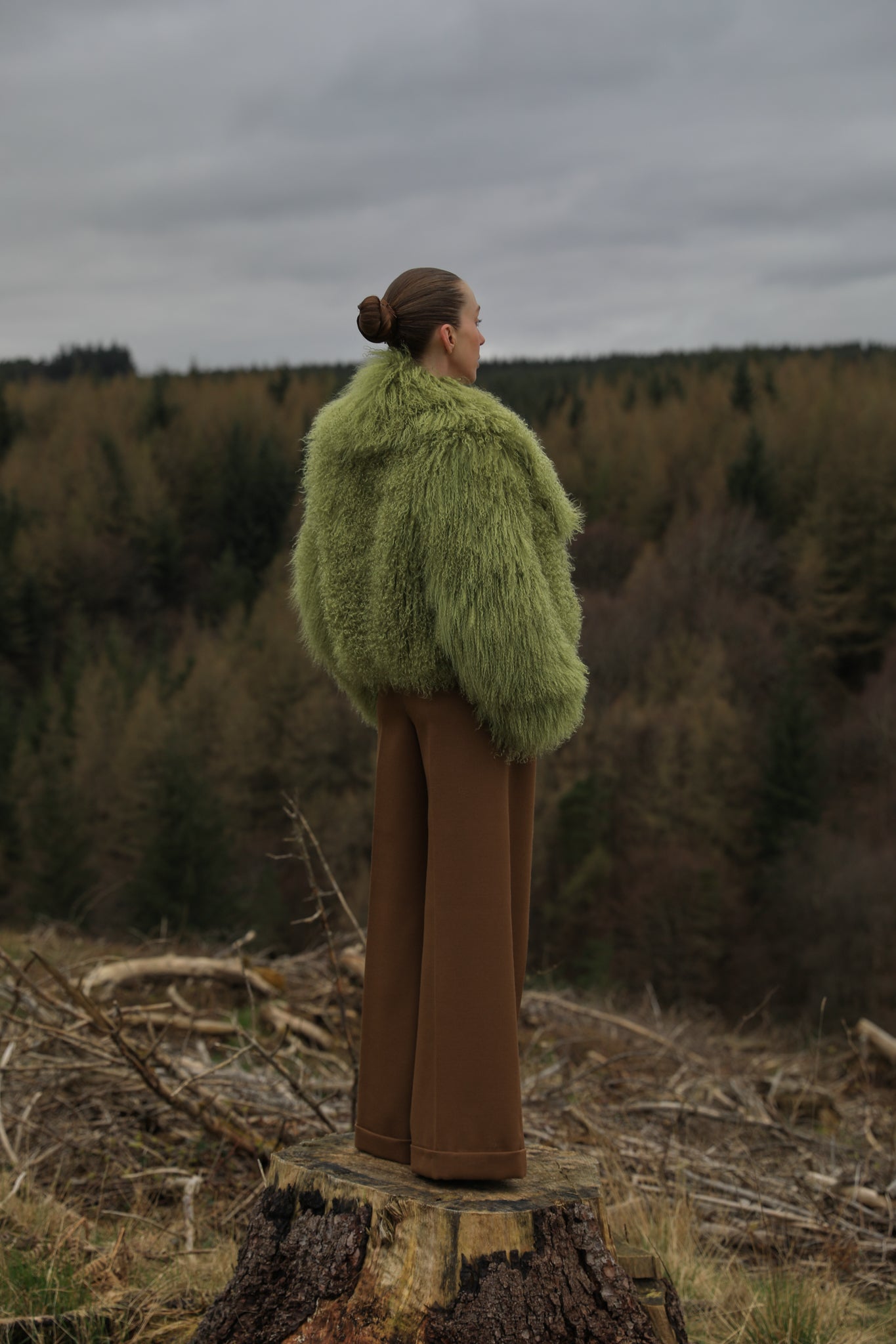 Olive voluminous collar Mongolian fur coat from Josephine Jones - A timeless staple piece exuding elegance and warmth, perfect for any occasion.