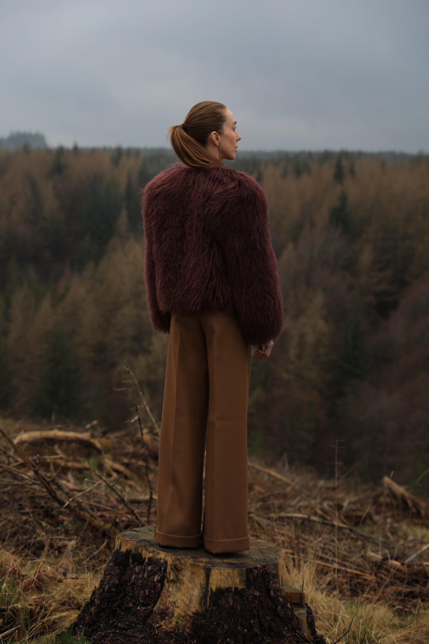 A sumptuous burgundy Mongolian fur coat from Josephine Jones, exuding elegance and luxury.