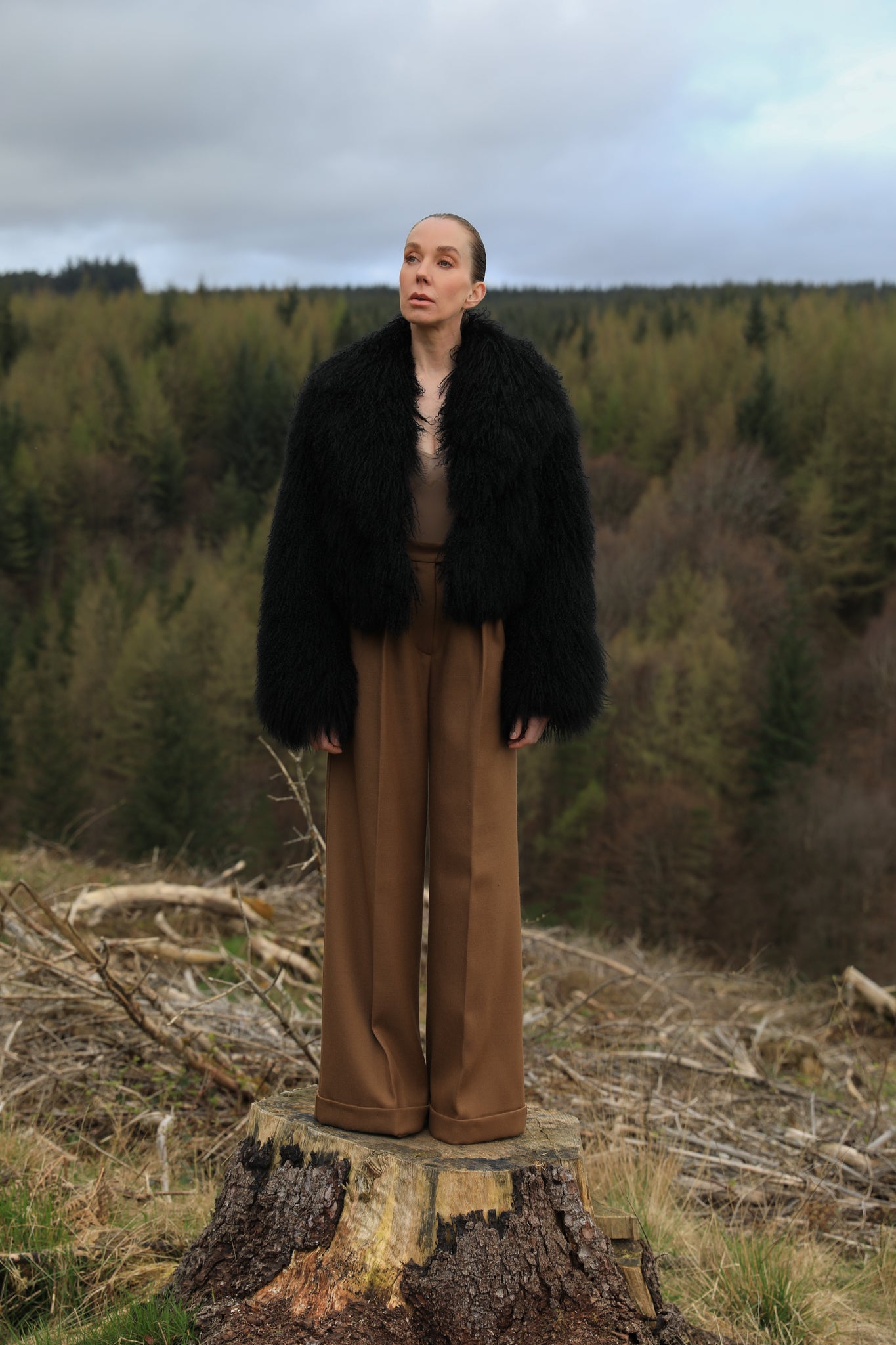 A timeless staple piece - Josephine Jones' black voluminous collar Mongolian fur coat, exuding elegance and sophistication.