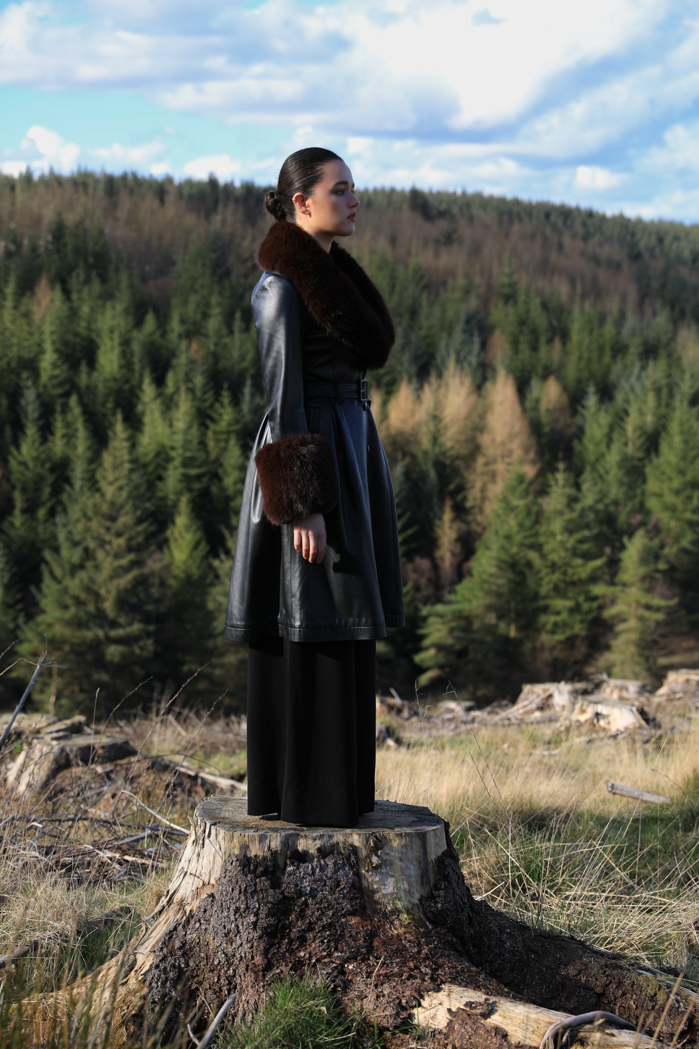 Josephine Jones genuine leather black trench coat with chocolate faux fur collar and cuffs - a timeless statement piece for any wardrobe.