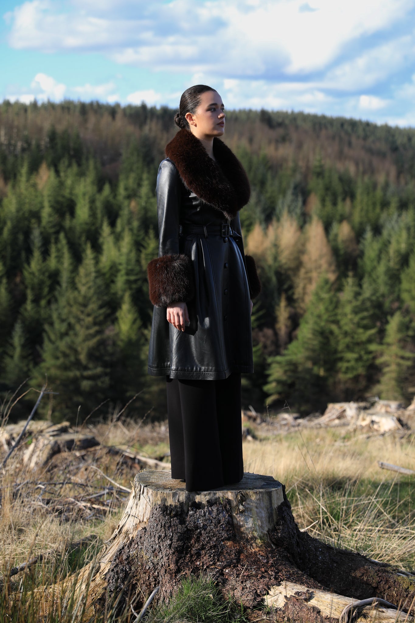 Josephine Jones genuine leather black trench coat with chocolate faux fur collar and cuffs - a timeless statement piece for any wardrobe.