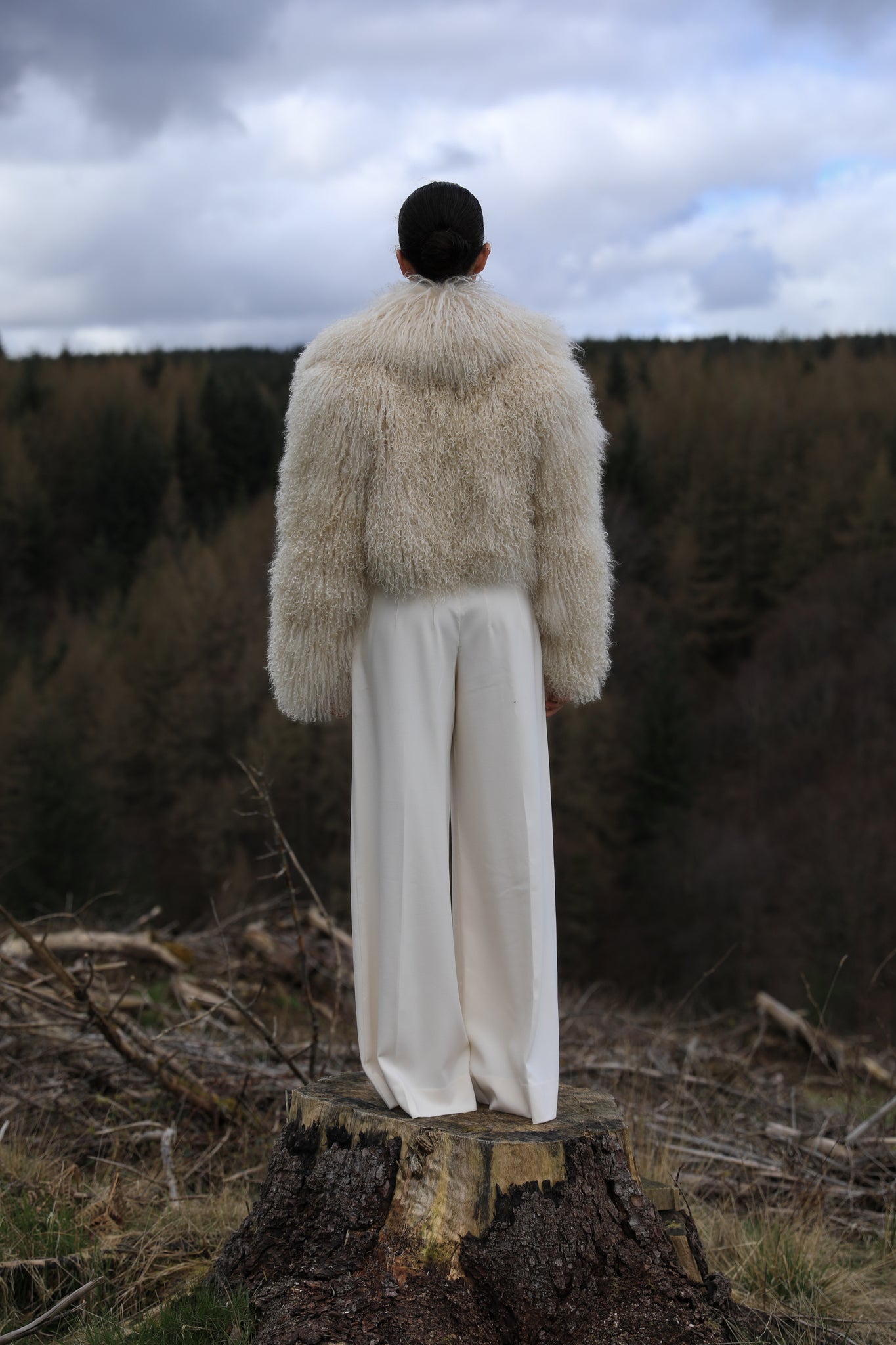 Ivory voluminous collar Mongolian fur coat from Josephine Jones - A timeless staple piece exuding elegance and sophistication, perfect for making a bold fashion statement.