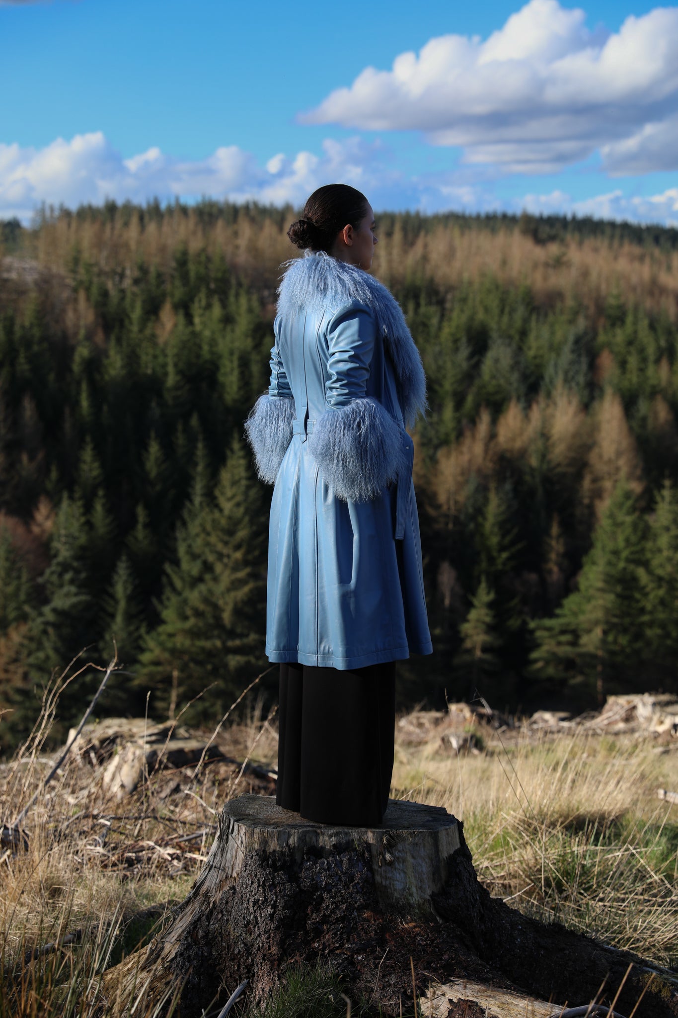 Josephine Jones Cornflower Blue Genuine Leather Trench Coat with Mongolian Fur Collar and Cuffs - Elevate your style with this luxurious trench coat featuring exquisite cornflower blue genuine leather and decadent Mongolian fur accents on the collar and cuffs.