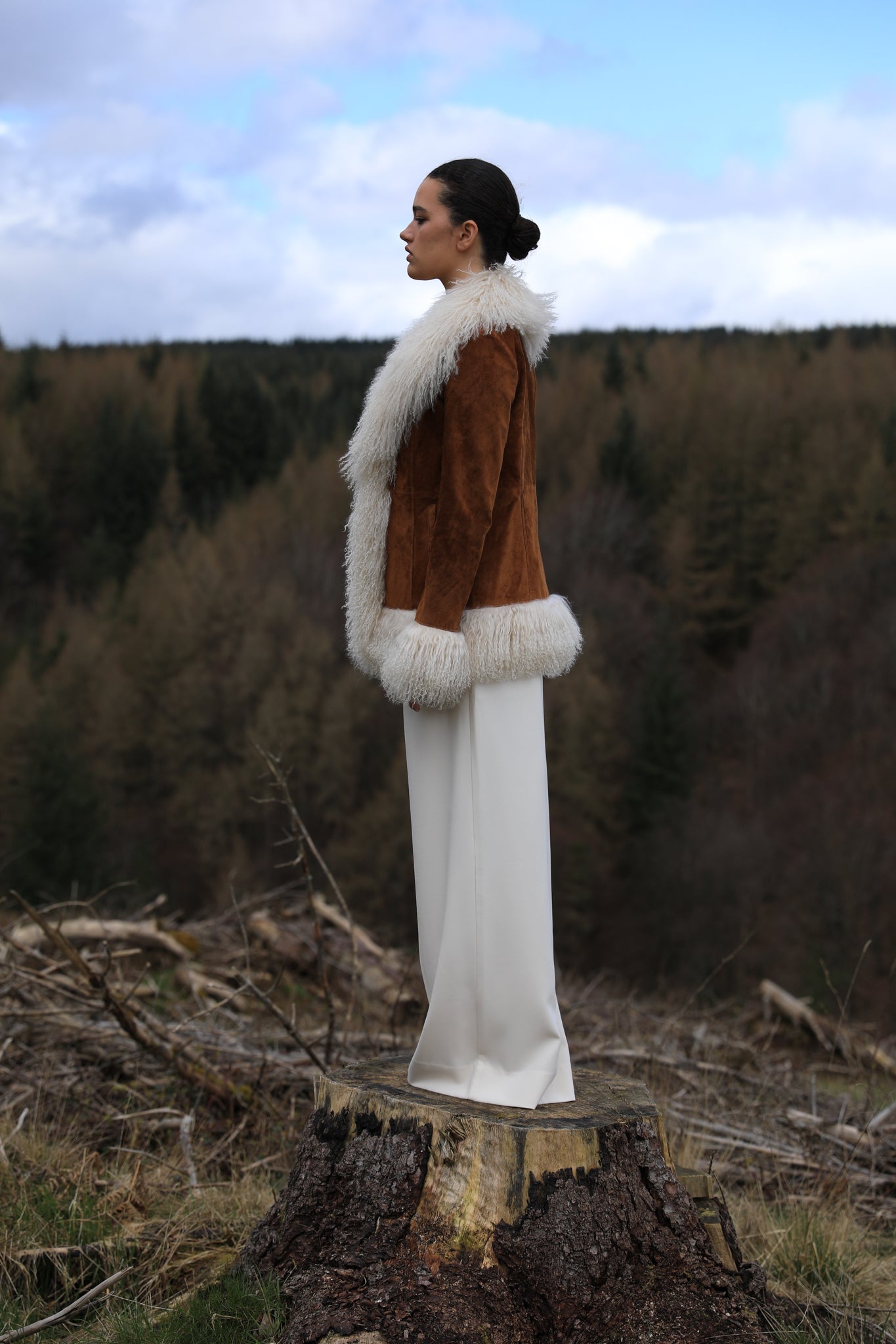 Josephine Jones tan suede Afghan Penny Lane style jacket with ivory Mongolian fur trims. A timeless classic in genuine suede, exuding elegance and warmth.