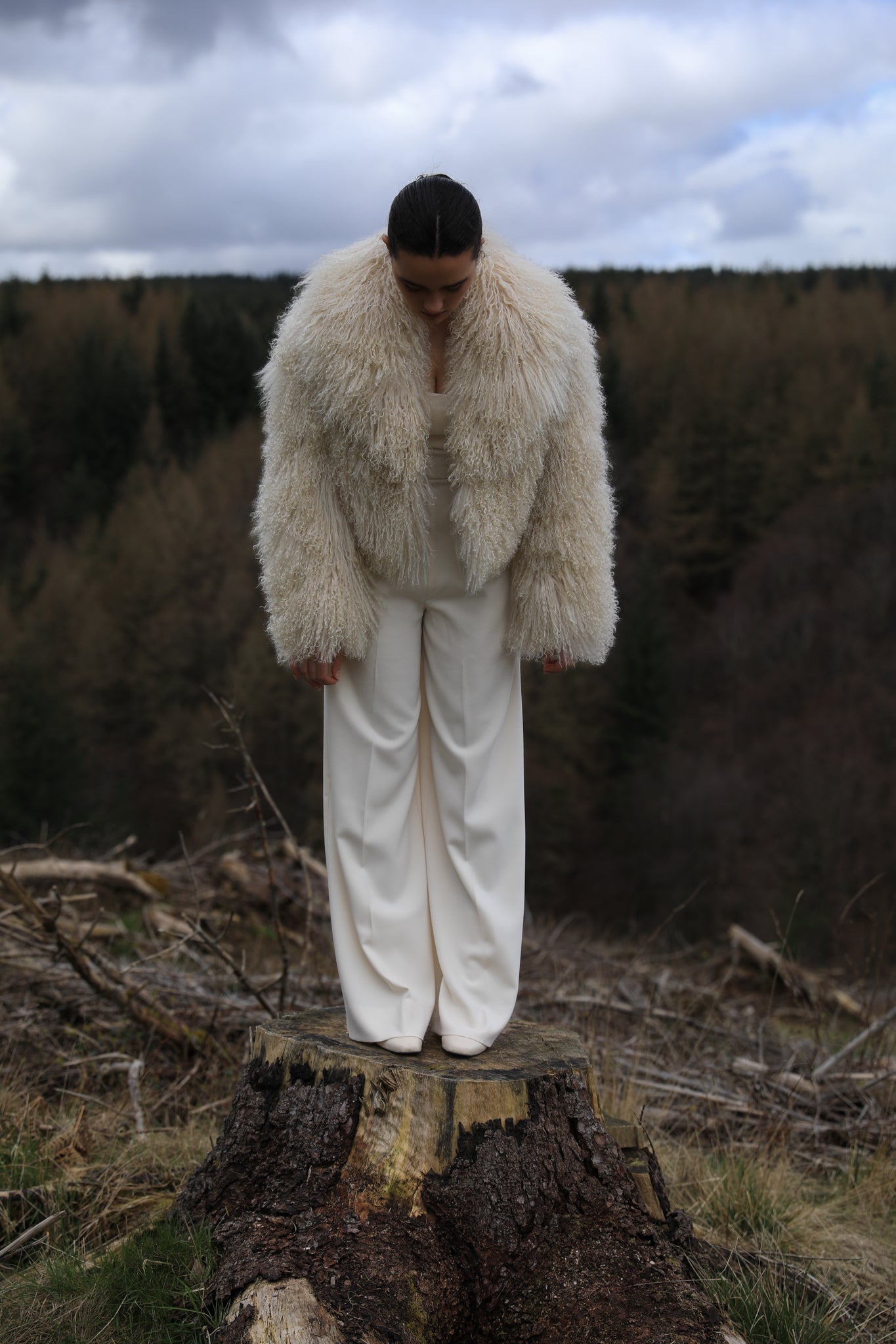 Ivory voluminous collar Mongolian fur coat from Josephine Jones - A timeless staple piece exuding elegance and sophistication, perfect for making a bold fashion statement.