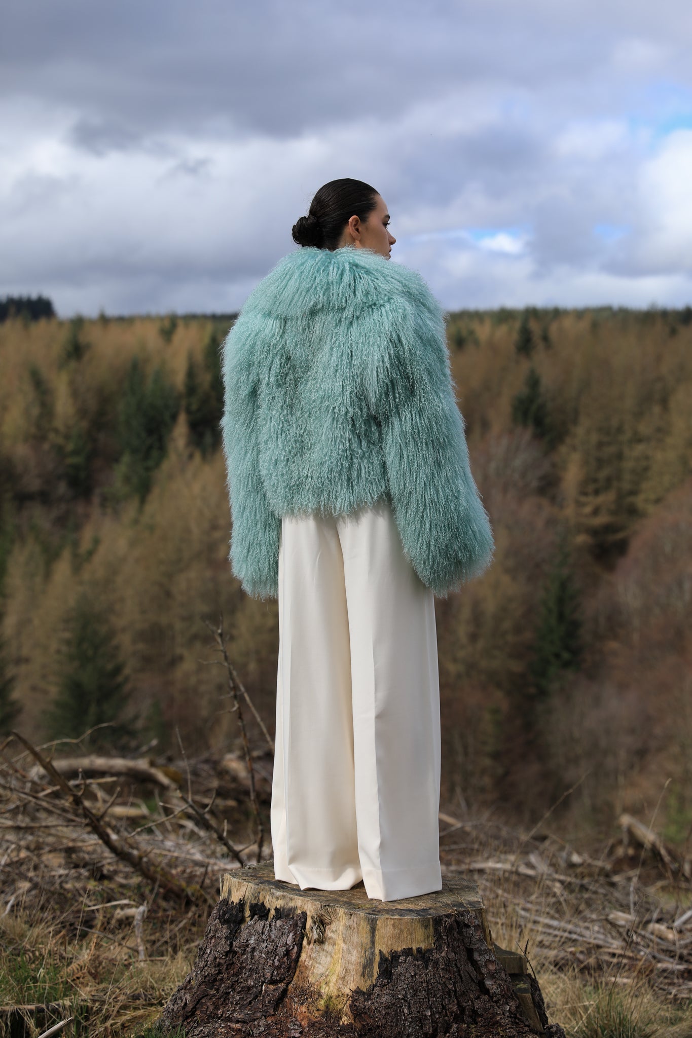 Josephine Jones' iconic mint voluminous collar Mongolian fur coat, a classic staple piece for luxurious winter fashion.