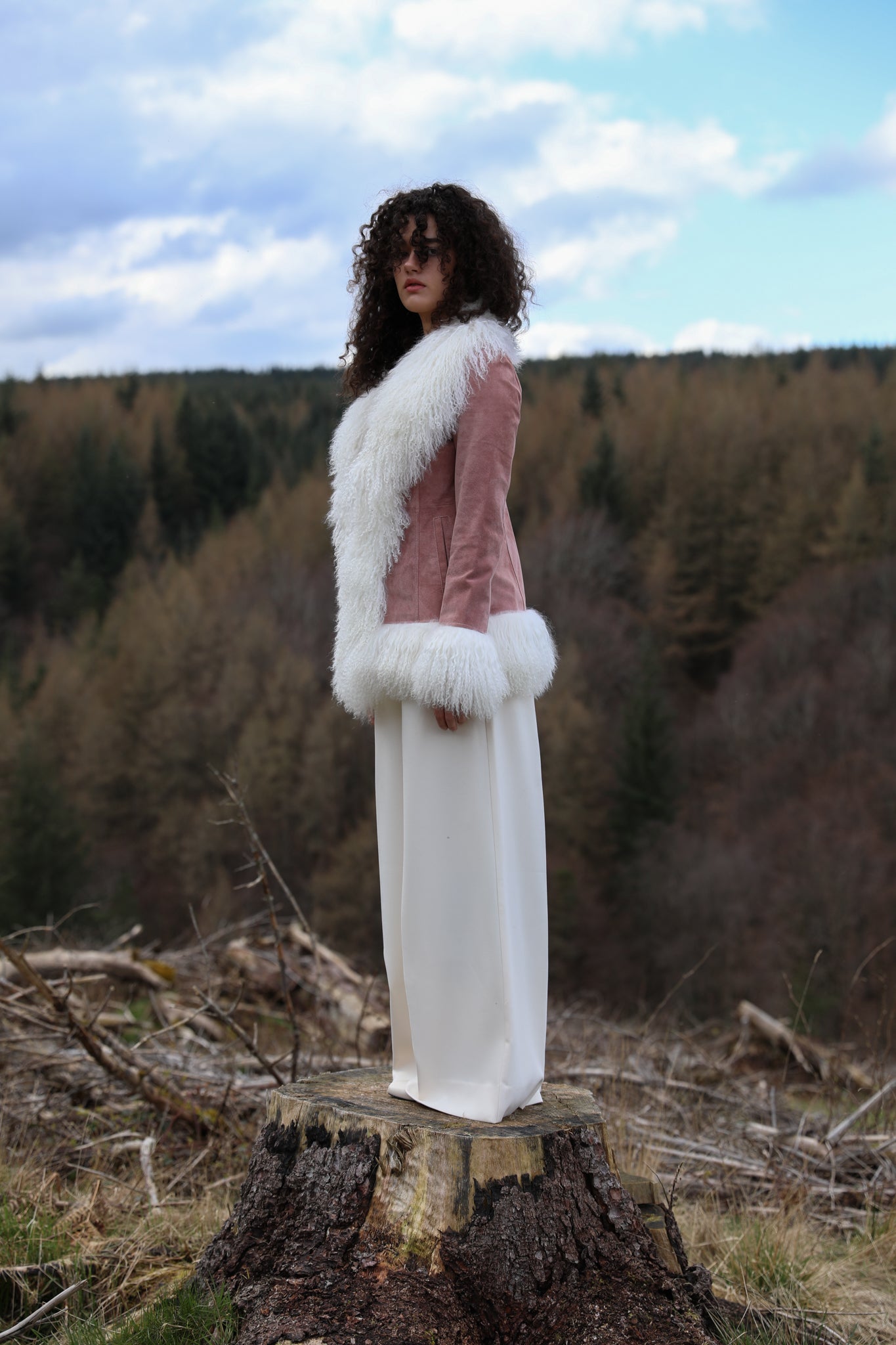 Josephine Jones genuine suede Afghan Penny Lane style jacket in rose suede with white Mongolian fur trims - luxurious outerwear epitomizing elegance and warmth.