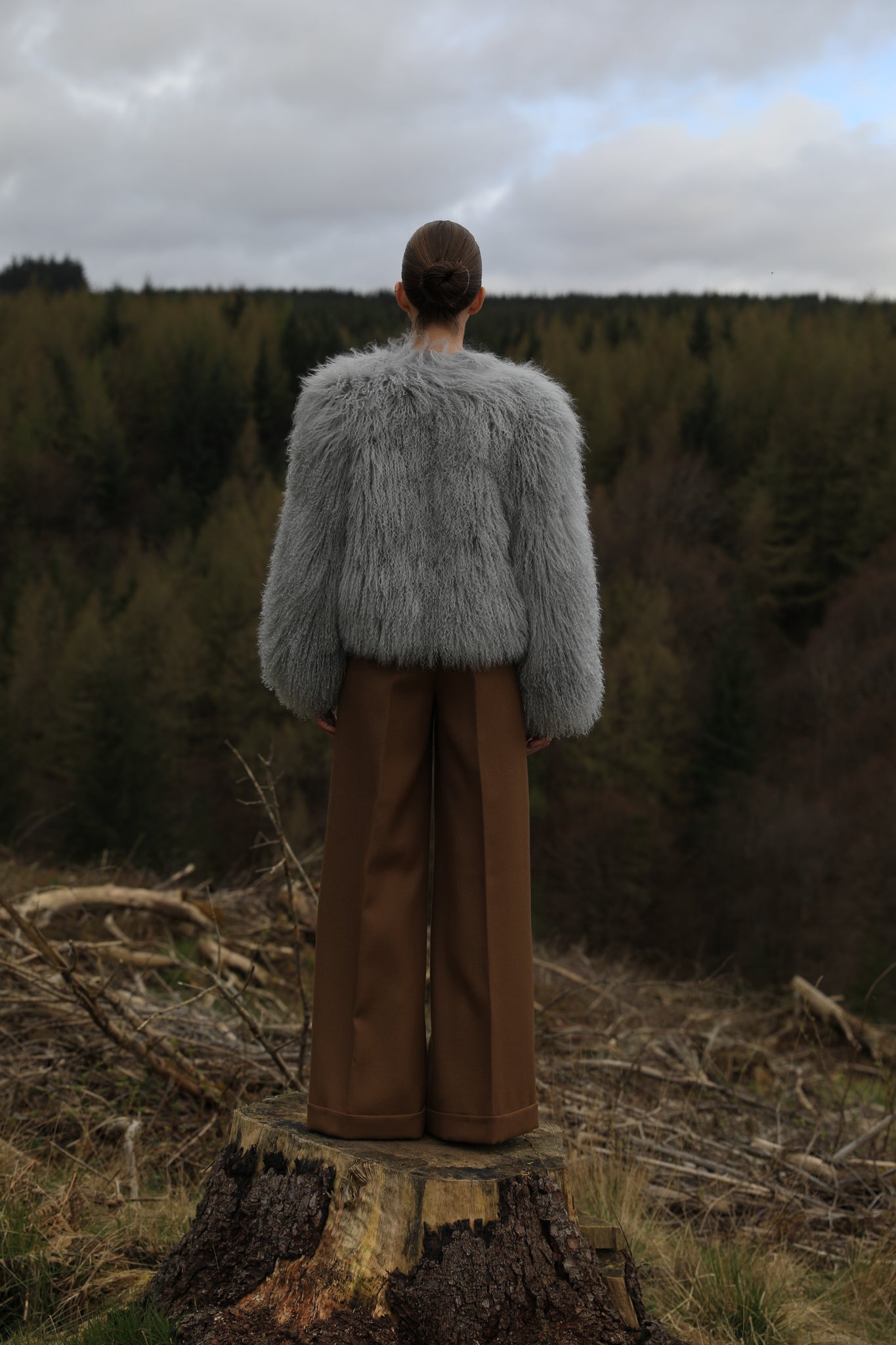 A luxurious grey Mongolian fur coat from Josephine Jones, showcasing exquisite craftsmanship and timeless elegance.