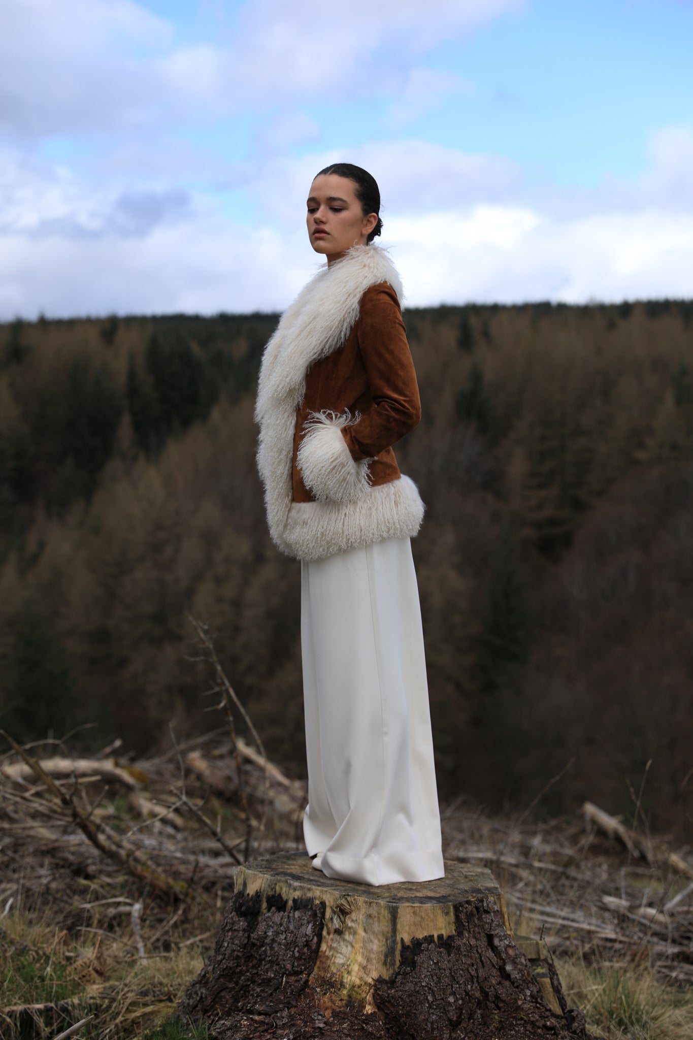 Josephine Jones tan suede Afghan Penny Lane style jacket with ivory Mongolian fur trims. A timeless classic in genuine suede, exuding elegance and warmth.