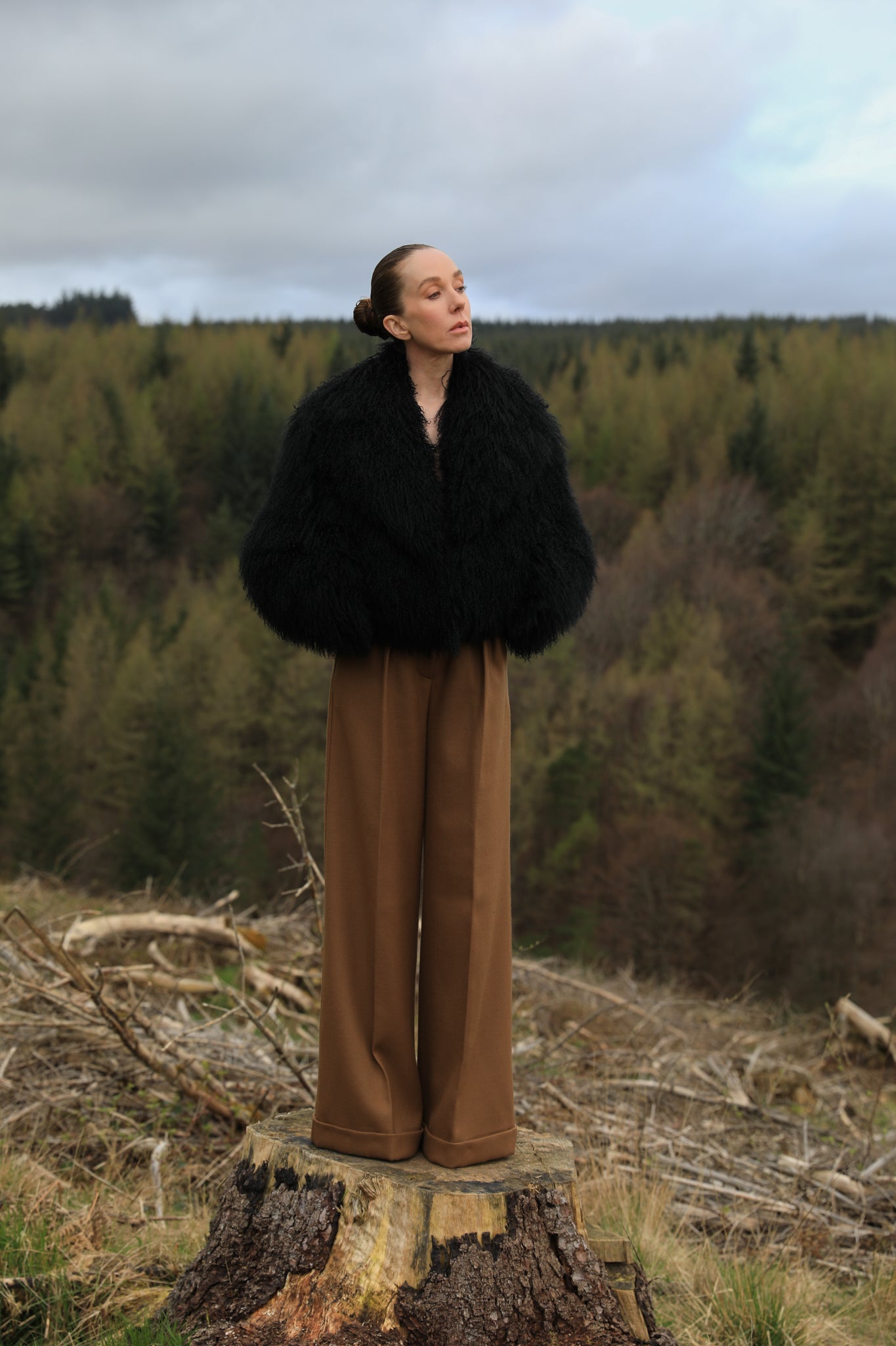 A timeless staple piece - Josephine Jones' black voluminous collar Mongolian fur coat, exuding elegance and sophistication.