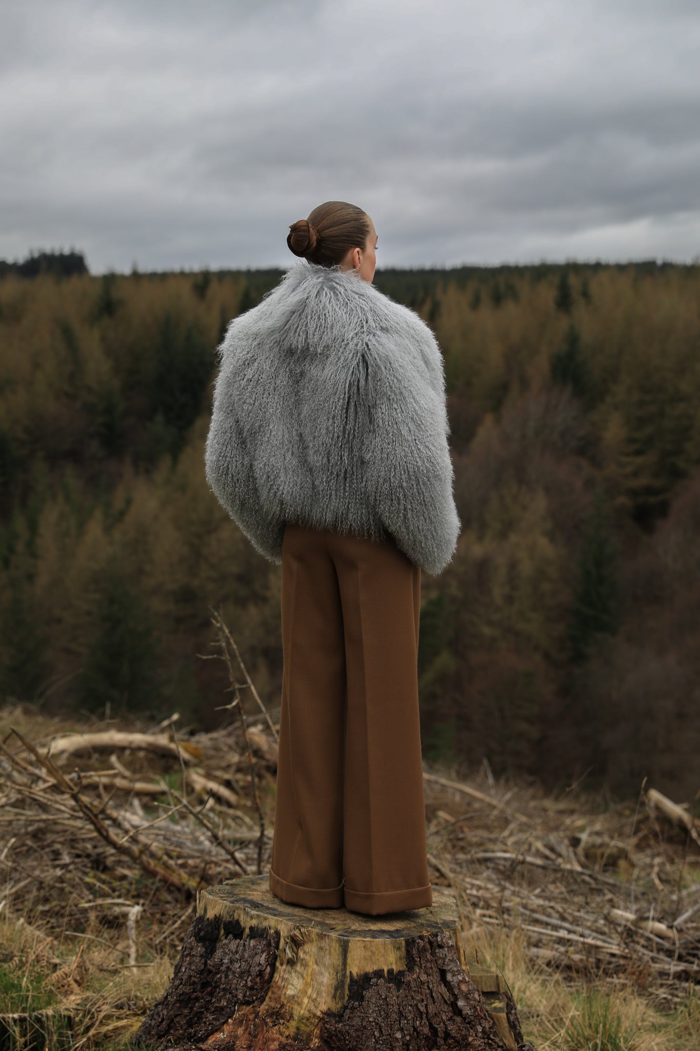 A sophisticated grey voluminous collar Mongolian fur coat from Josephine Jones, a timeless staple piece exuding elegance and luxury.