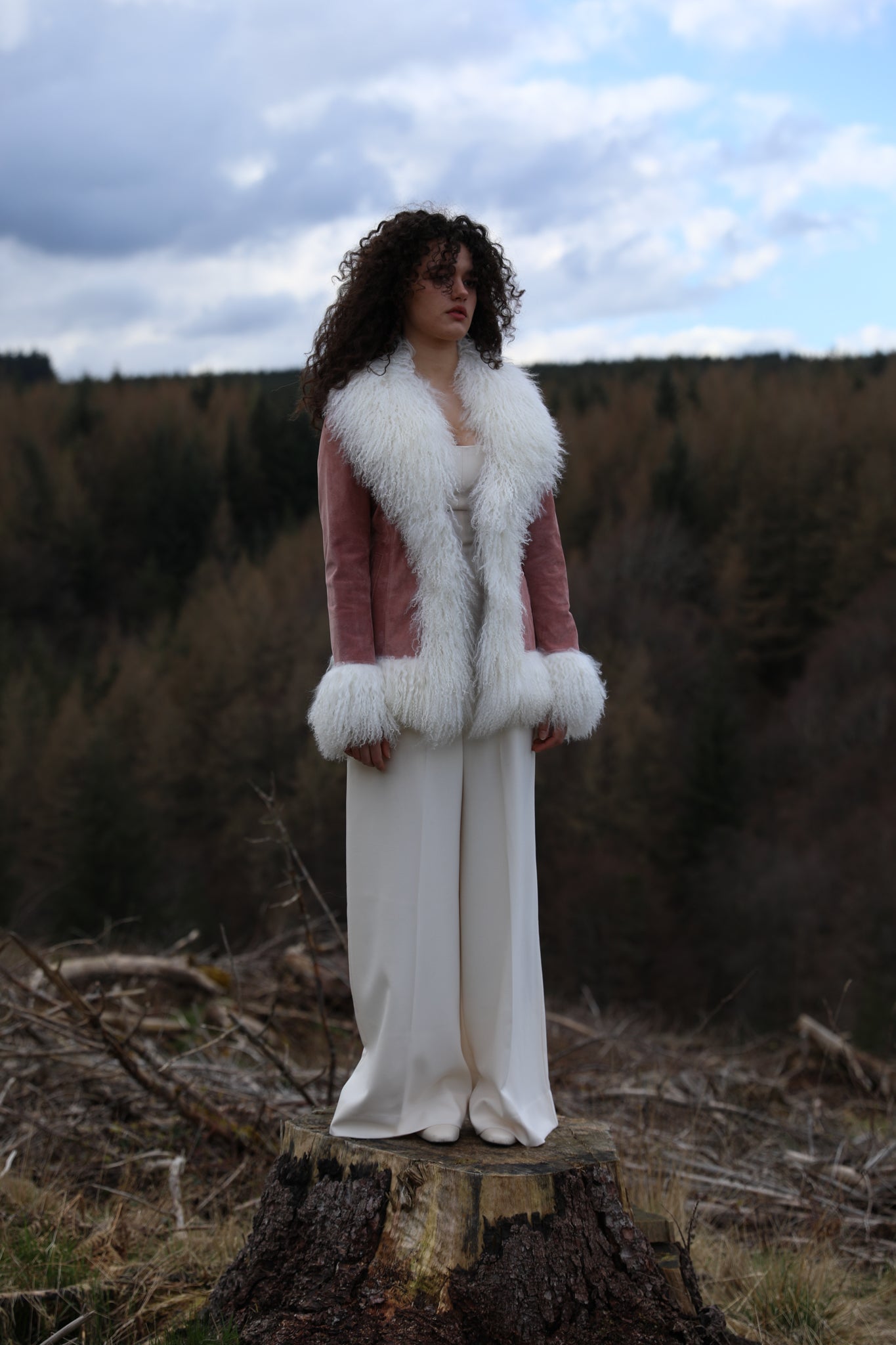 Josephine Jones genuine suede Afghan Penny Lane style jacket in rose suede with white Mongolian fur trims - luxurious outerwear epitomizing elegance and warmth.