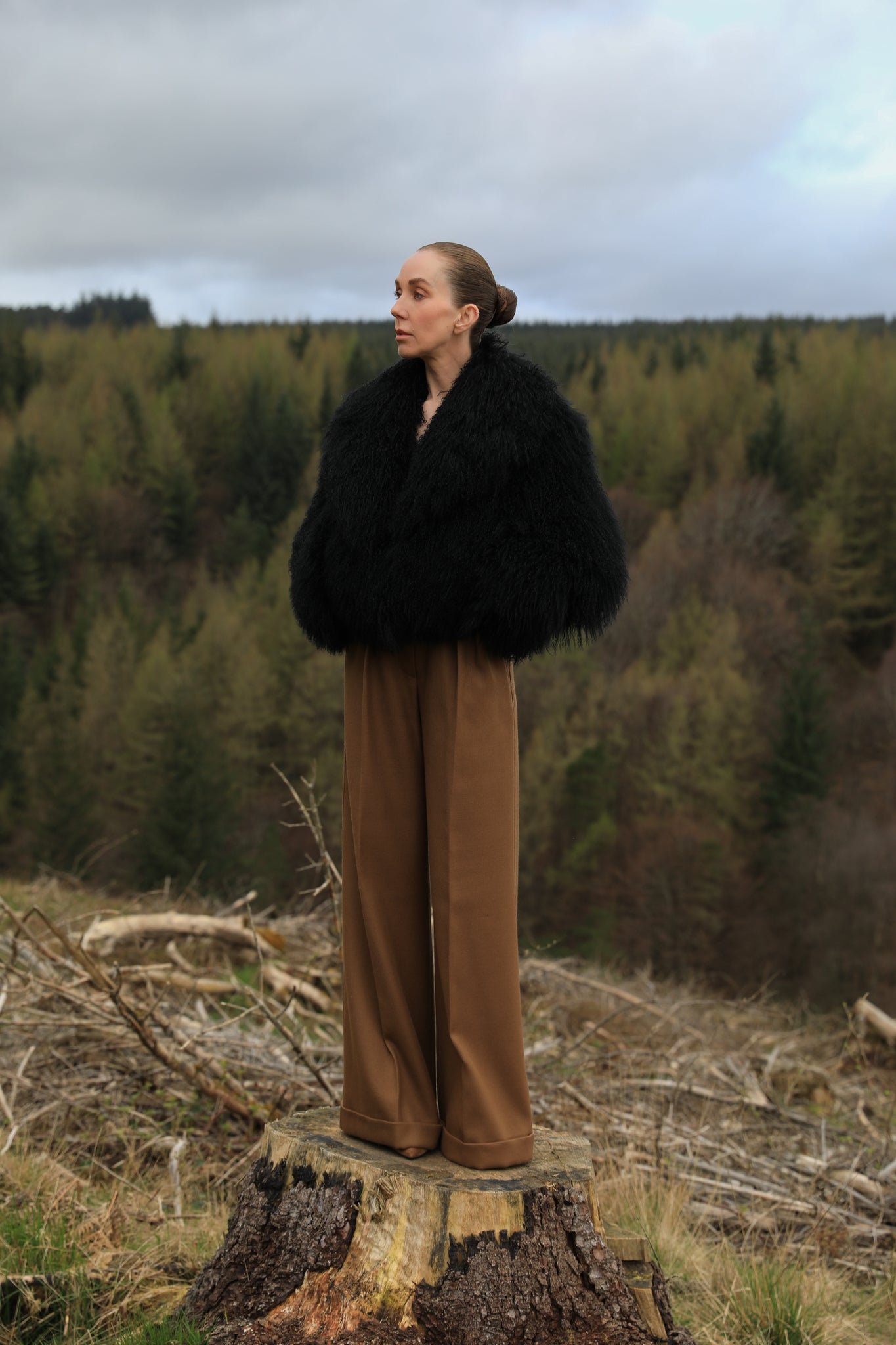 A timeless staple piece - Josephine Jones' black voluminous collar Mongolian fur coat, exuding elegance and sophistication.