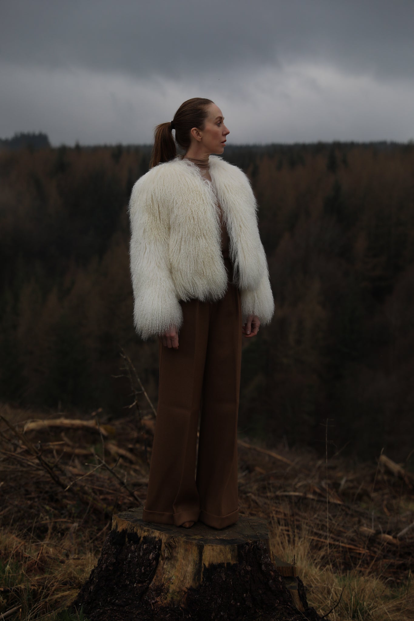 A luxurious white Mongolian fur coat from Josephine Jones, exuding elegance and sophistication, perfect for staying warm in style during the colder seasons.