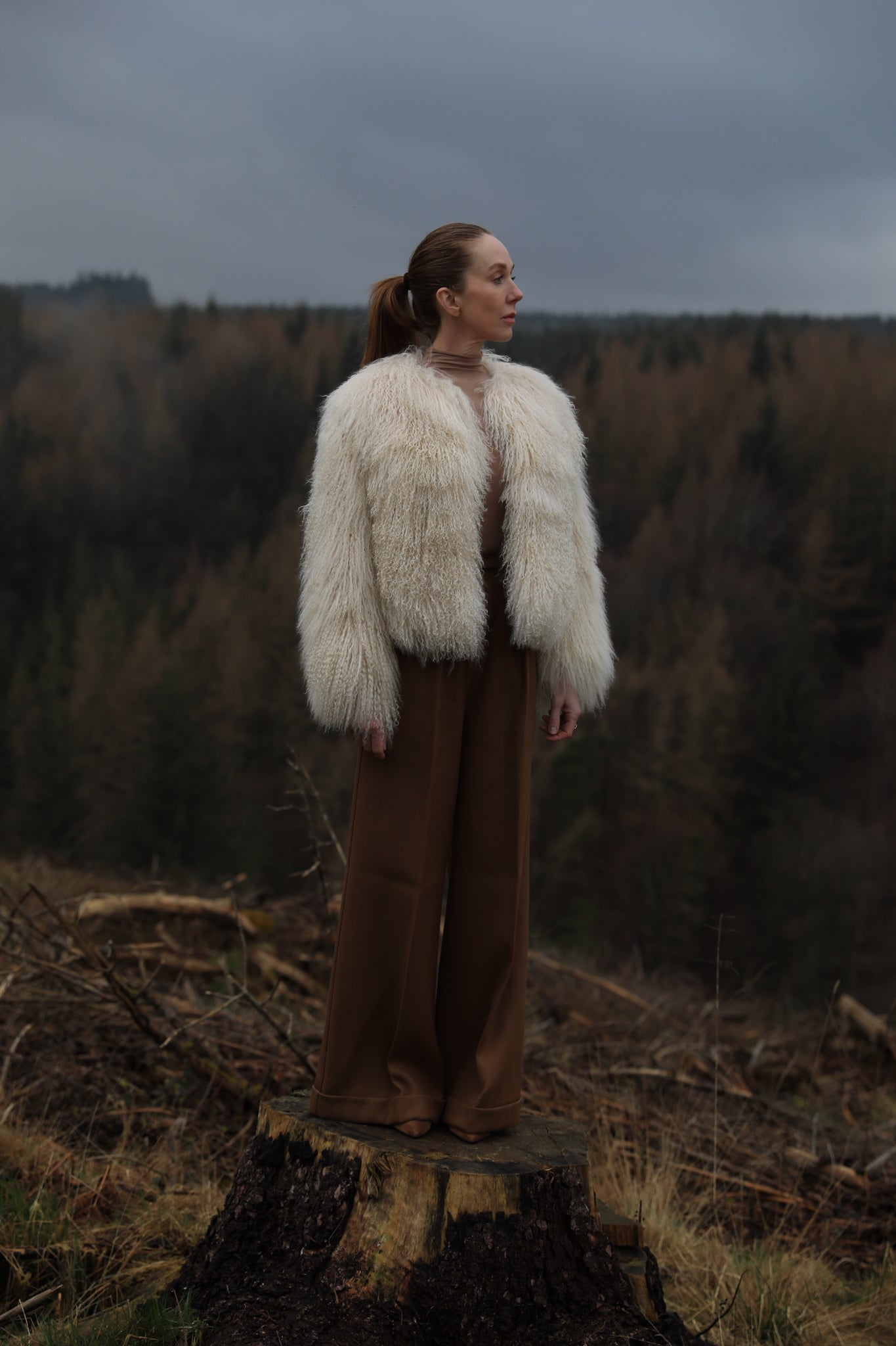 Josephine Jones Ivory Mongolian Fur Coat' - Luxurious ivory Mongolian fur coat designed by Josephine Jones, showcasing exquisite craftsmanship and unparalleled elegance.