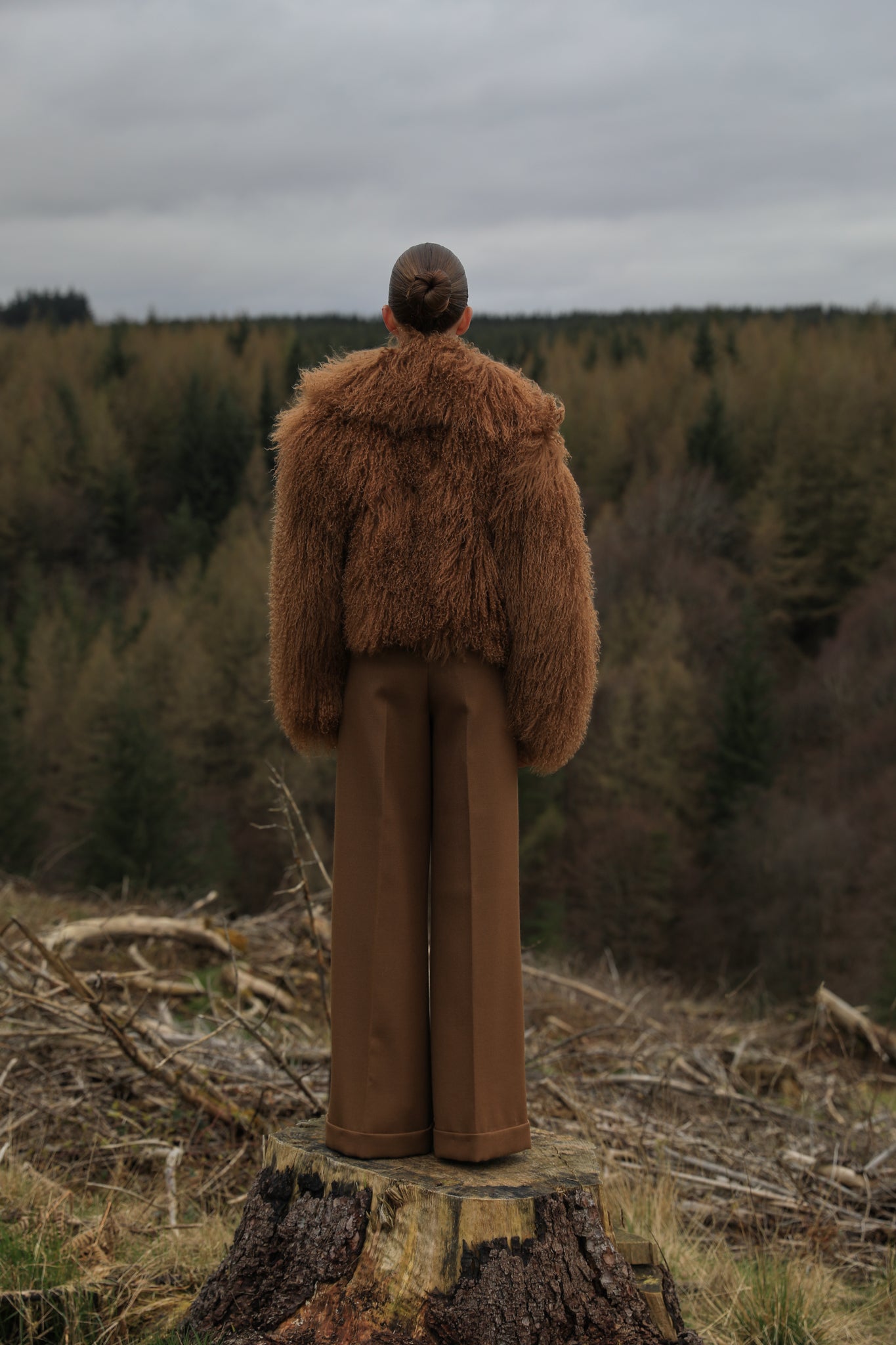 A stunning tobacco-colored voluminous collar Mongolian fur coat from Josephine Jones, the epitome of timeless elegance and luxury fashion