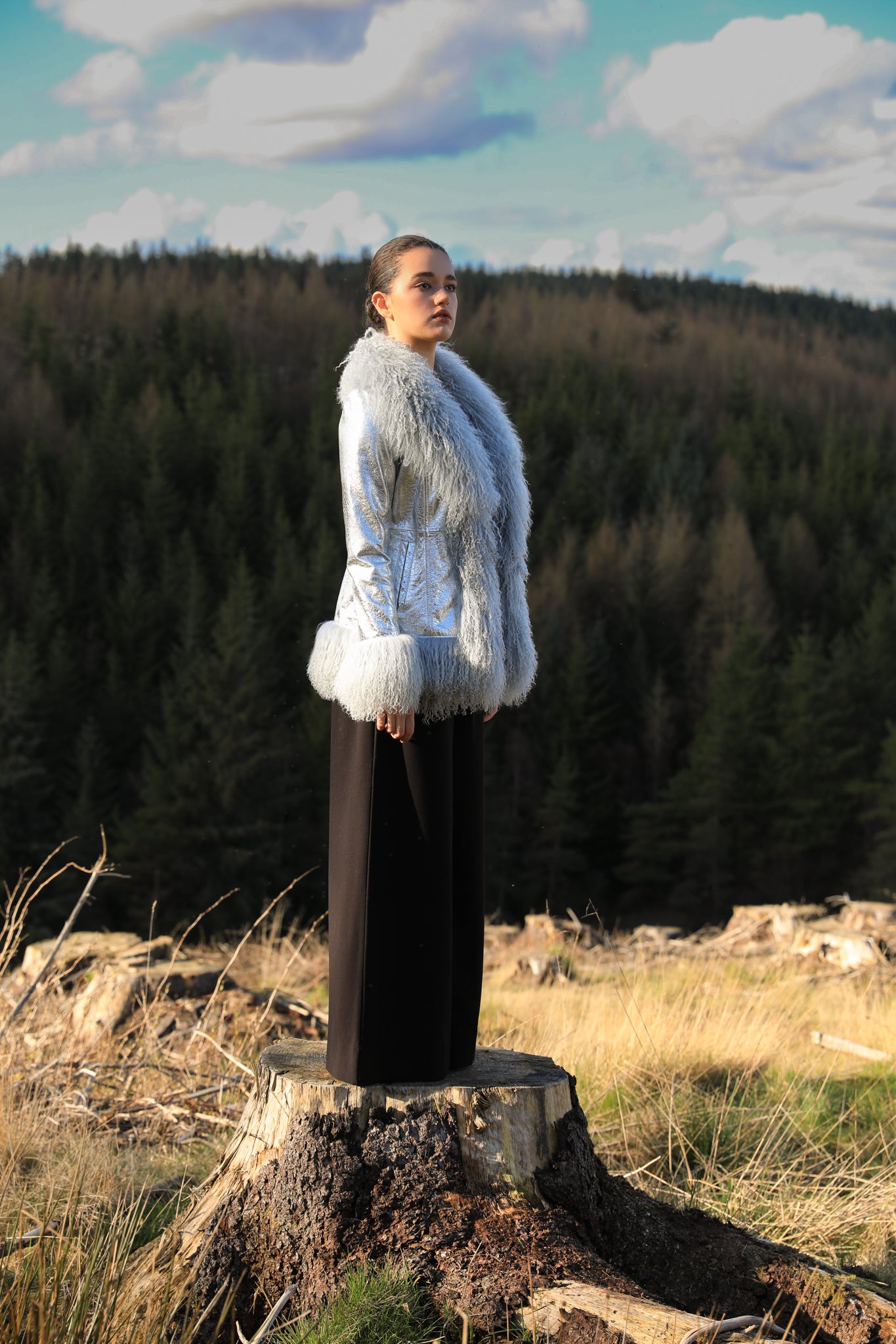 Josephine Jones' Silver Suede Afghan Penny Lane Jacket with Grey Mongolian Fur Trims - A luxurious statement piece crafted from genuine suede leather, featuring exquisite silver hue and sumptuous grey Mongolian fur accents. Elevate your style with this iconic and timeless jacket.