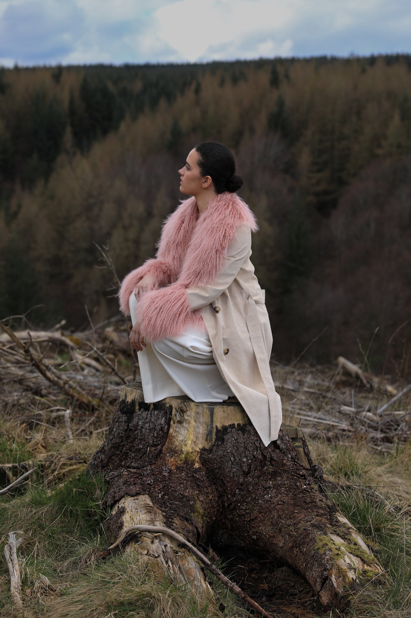 Ivory genuine suede trench wrap coat with blush Mongolian collar and cuffs, designed by Josephine Jones. Luxuriously crafted outerwear perfect for adding elegance to any ensemble.