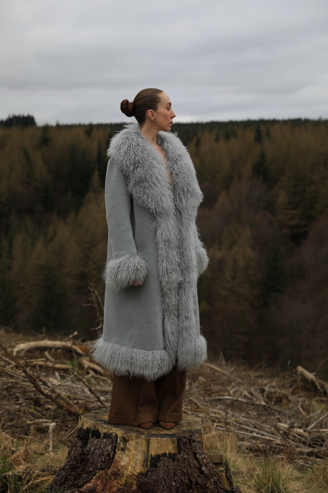 Josephine Jones bestselling long genuine shearling coat in grey, featuring exquisite Mongolian fur trims. Elevate your winter style with this luxurious outerwear essential.