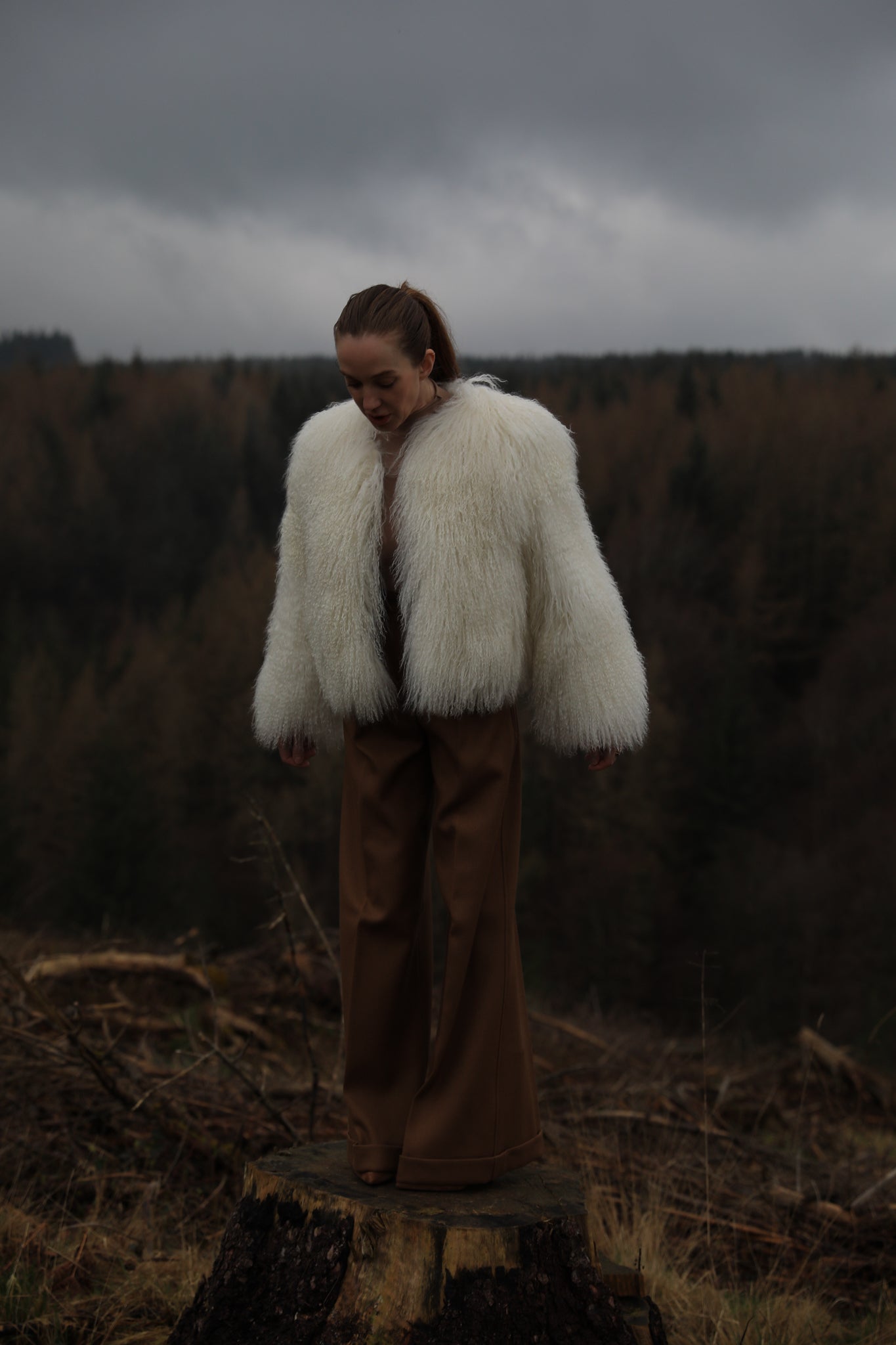 A luxurious white Mongolian fur coat from Josephine Jones, exuding elegance and sophistication, perfect for staying warm in style during the colder seasons.