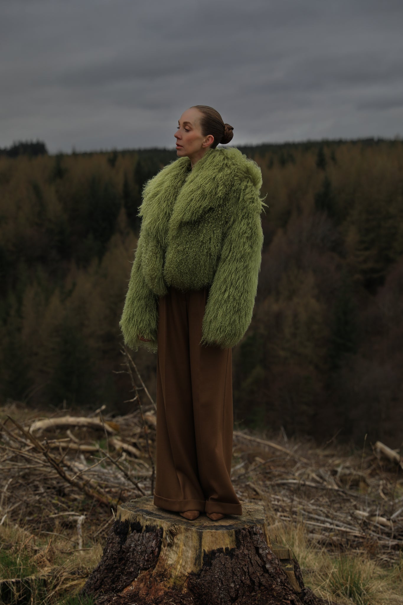 Olive voluminous collar Mongolian fur coat from Josephine Jones - A timeless staple piece exuding elegance and warmth, perfect for any occasion.