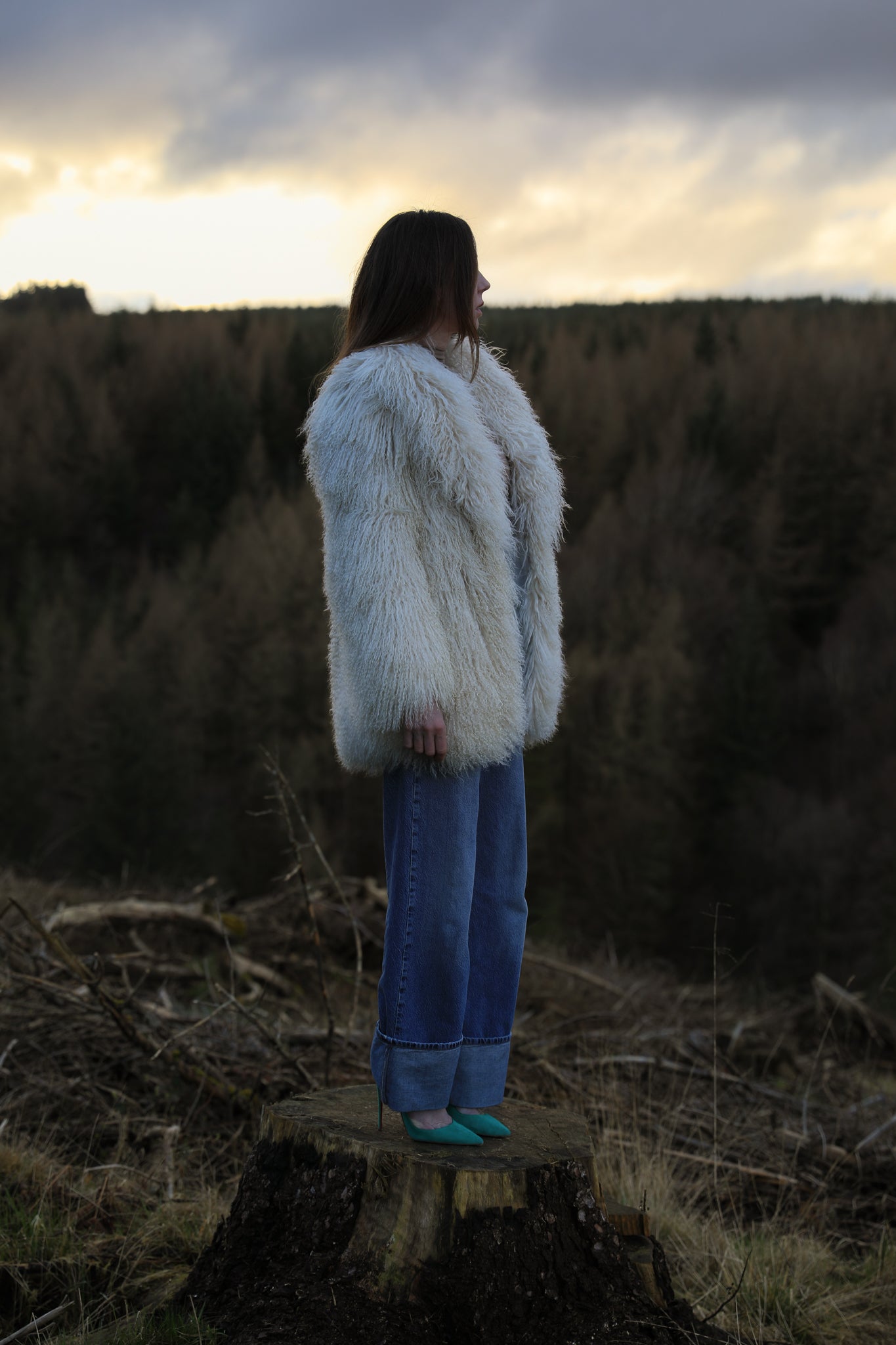 Ivory Mongolian fur mid-length coat from Josephine Jones, offering timeless elegance and luxurious warmth for any occasion.