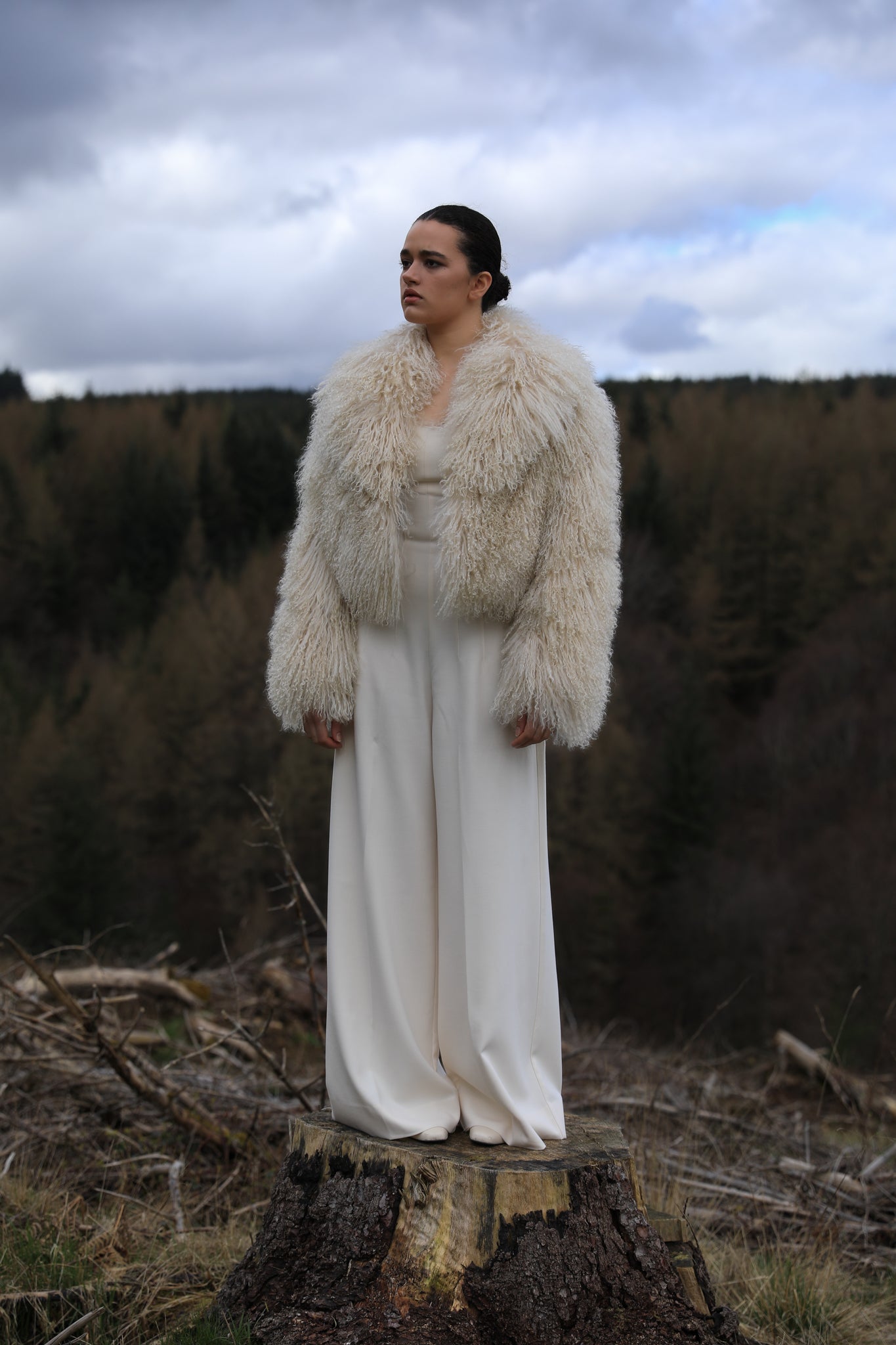 Ivory voluminous collar Mongolian fur coat from Josephine Jones - A timeless staple piece exuding elegance and sophistication, perfect for making a bold fashion statement.