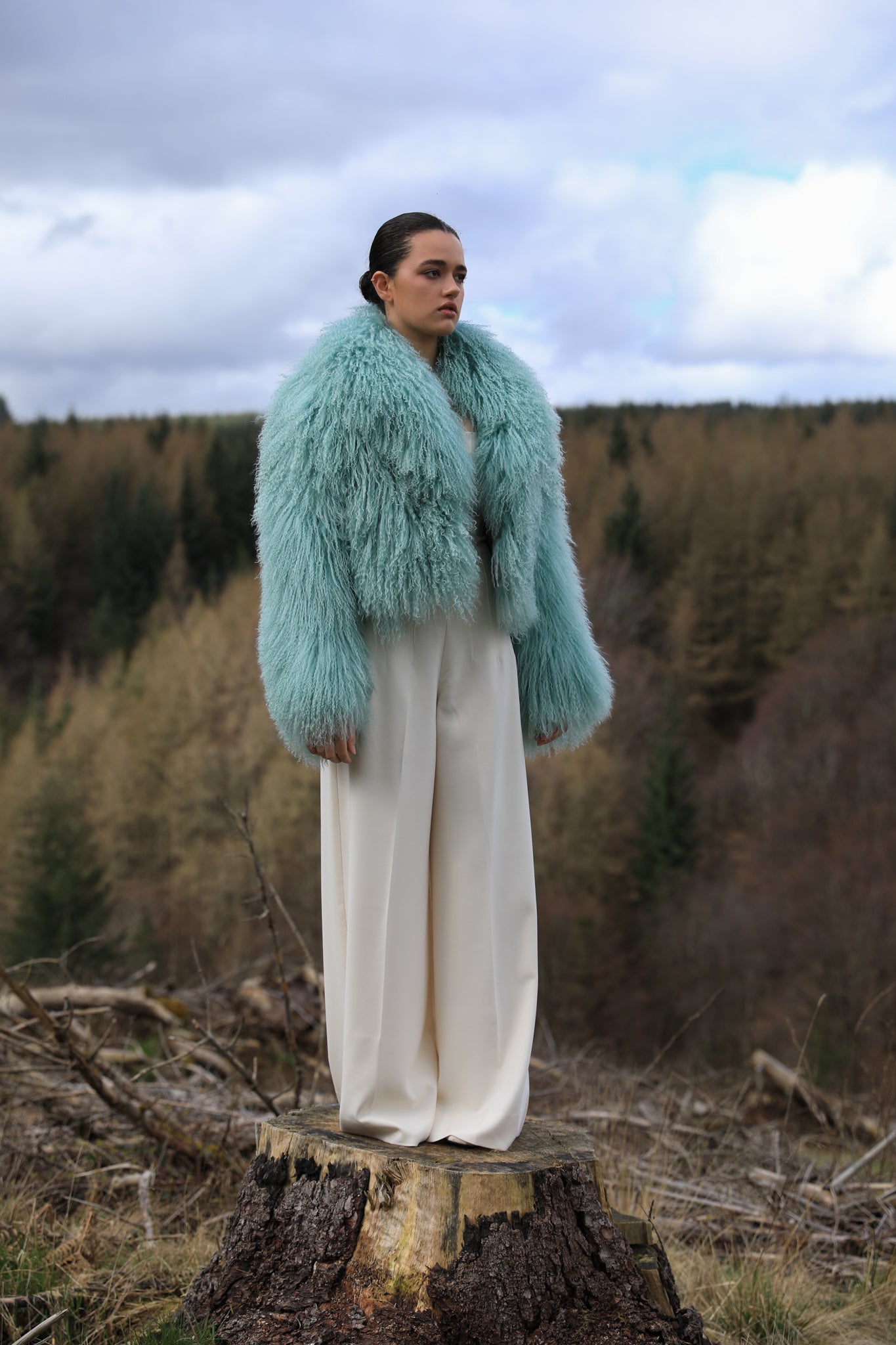 Josephine Jones' iconic mint voluminous collar Mongolian fur coat, a classic staple piece for luxurious winter fashion.