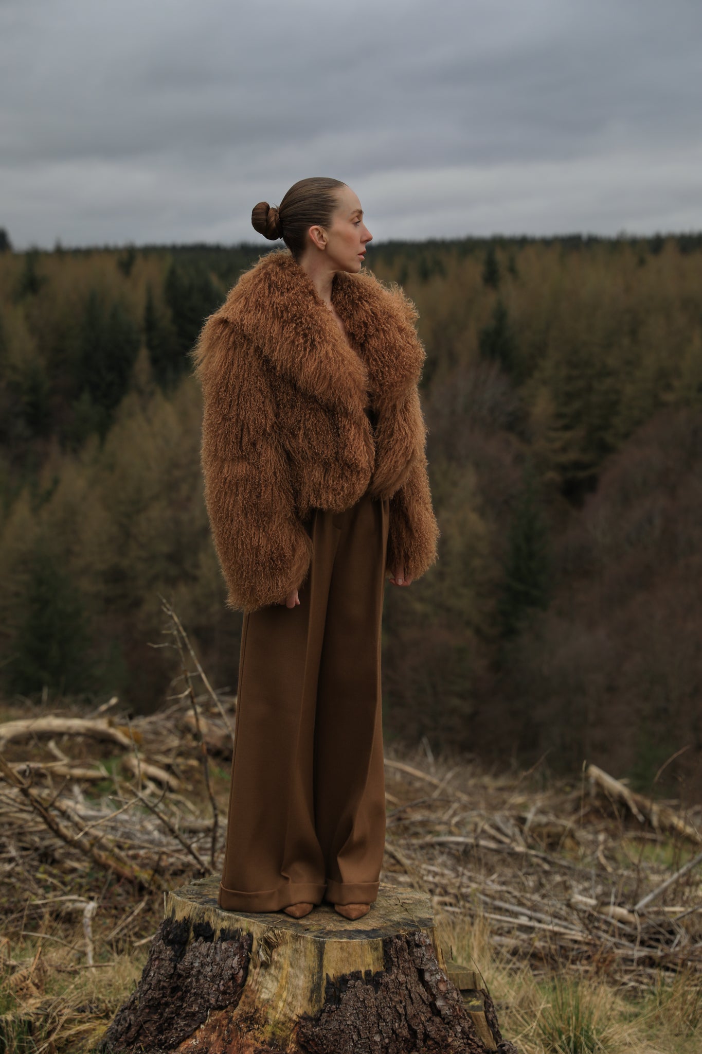 A stunning tobacco-colored voluminous collar Mongolian fur coat from Josephine Jones, the epitome of timeless elegance and luxury fashion