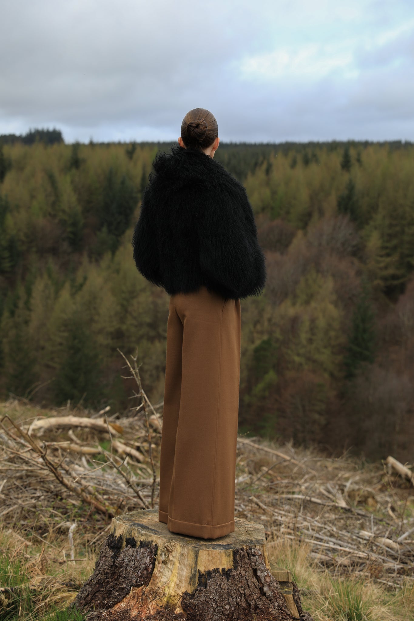 A timeless staple piece - Josephine Jones' black voluminous collar Mongolian fur coat, exuding elegance and sophistication.