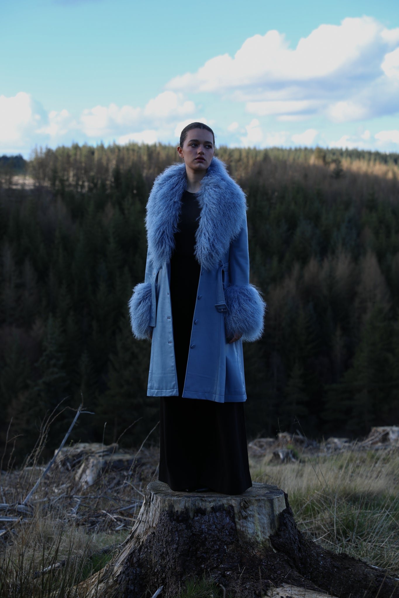 Josephine Jones Cornflower Blue Genuine Leather Trench Coat with Mongolian Fur Collar and Cuffs - Elevate your style with this luxurious trench coat featuring exquisite cornflower blue genuine leather and decadent Mongolian fur accents on the collar and cuffs.