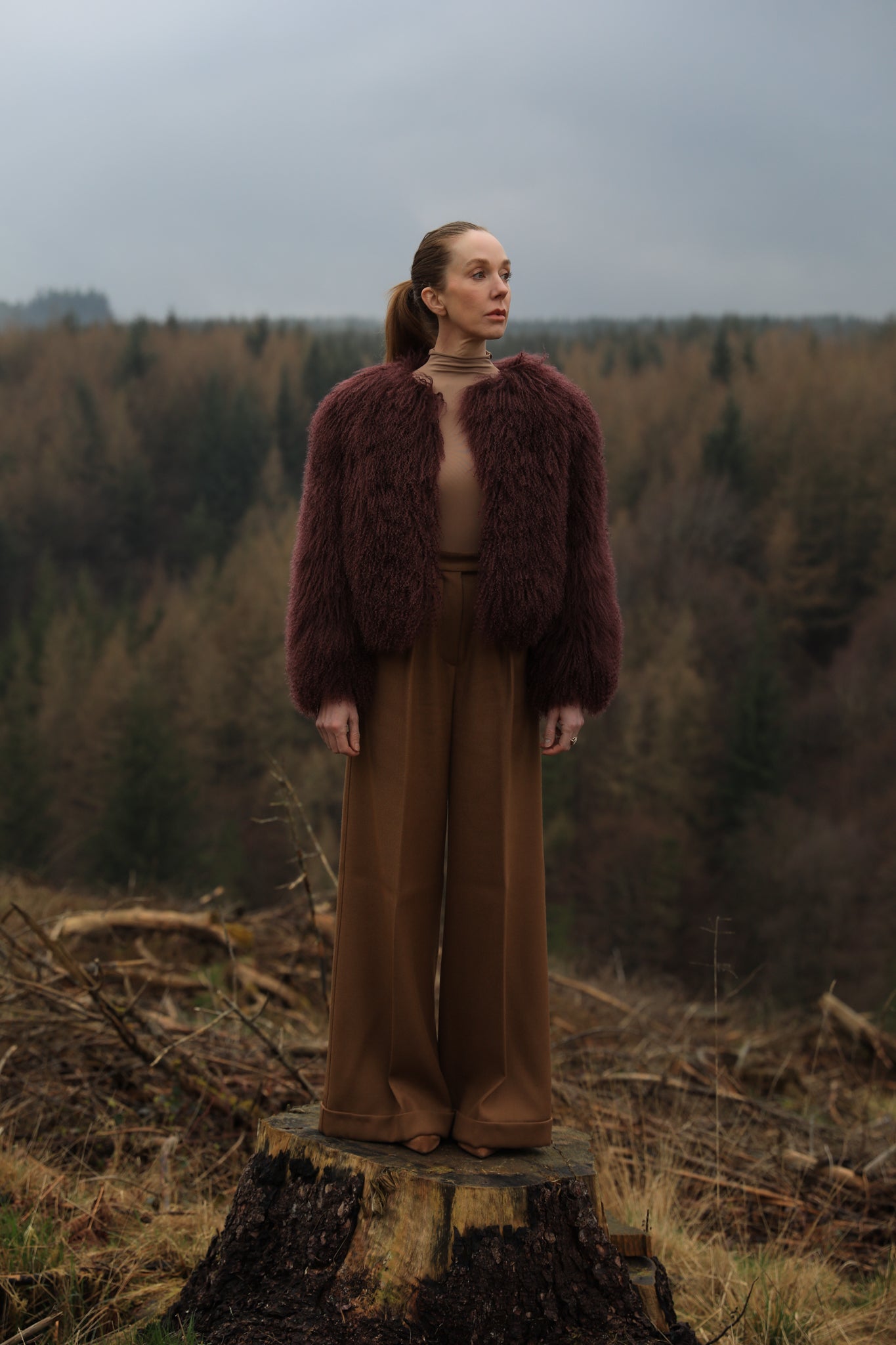 A sumptuous burgundy Mongolian fur coat from Josephine Jones, exuding elegance and luxury.