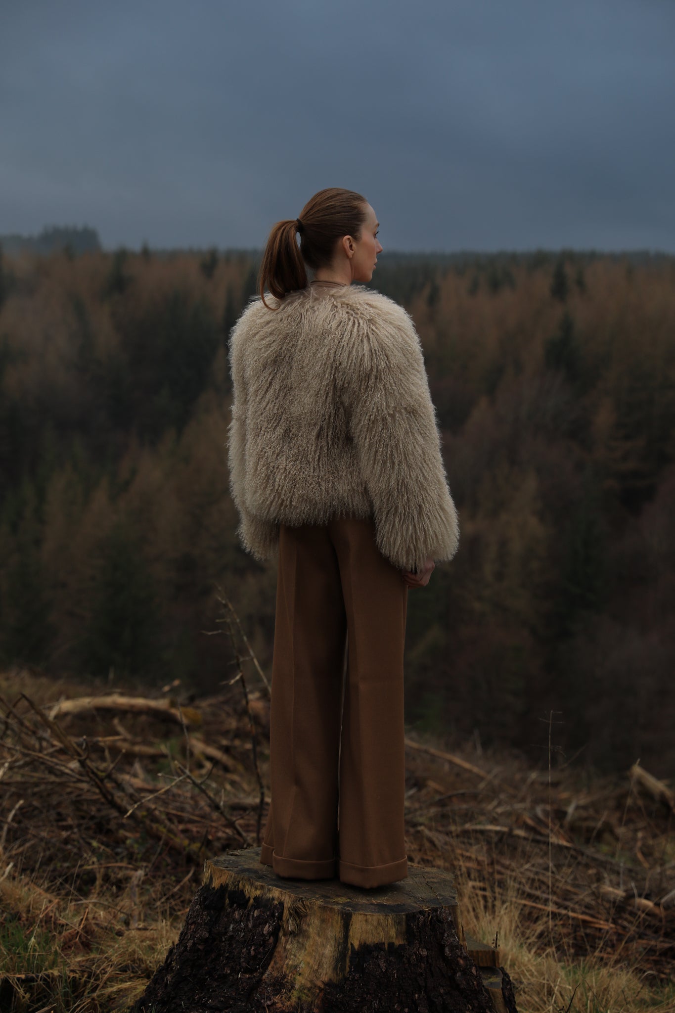 A sophisticated beige Mongolian fur coat from Josephine Jones, exuding elegance and warmth, perfect for adding a touch of luxury to any outfit.