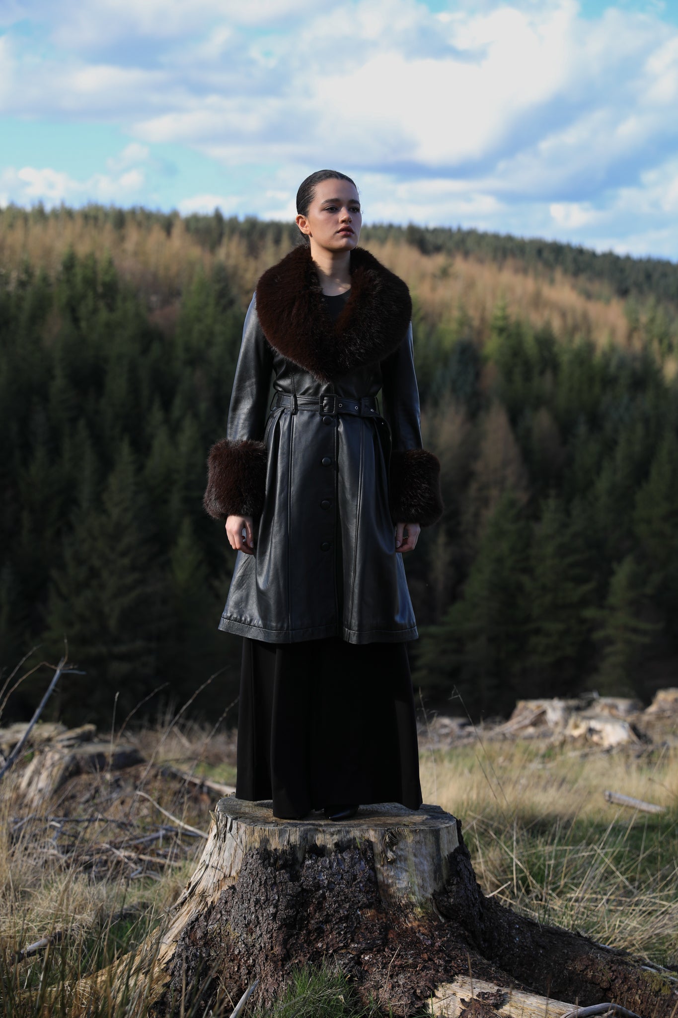 Josephine Jones genuine leather black trench coat with chocolate faux fur collar and cuffs - a timeless statement piece for any wardrobe.