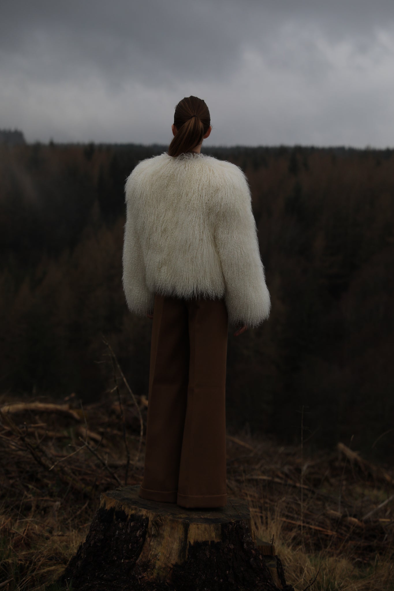 A luxurious white Mongolian fur coat from Josephine Jones, exuding elegance and sophistication, perfect for staying warm in style during the colder seasons.