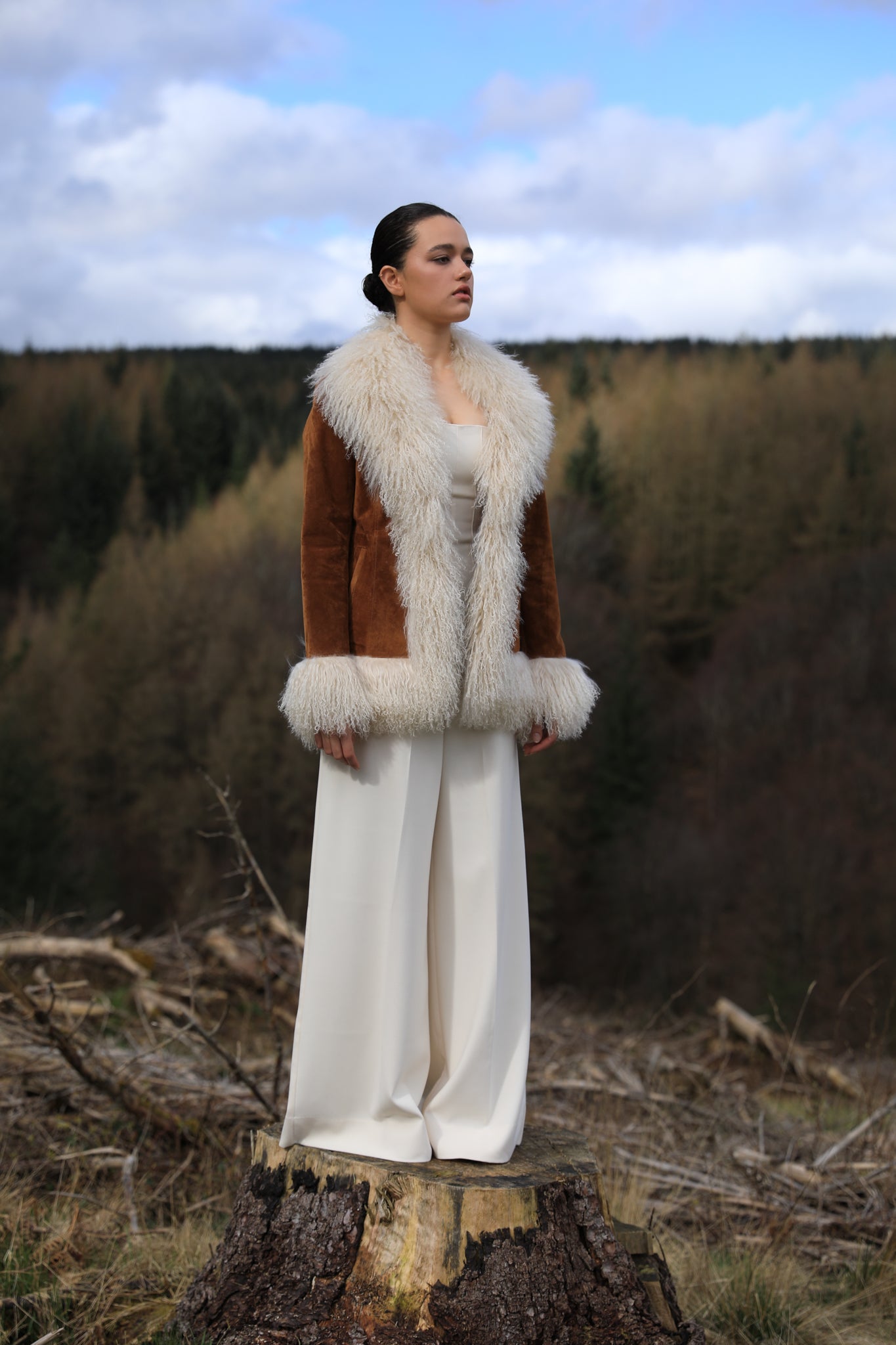 Josephine Jones tan suede Afghan Penny Lane style jacket with ivory Mongolian fur trims. A timeless classic in genuine suede, exuding elegance and warmth.