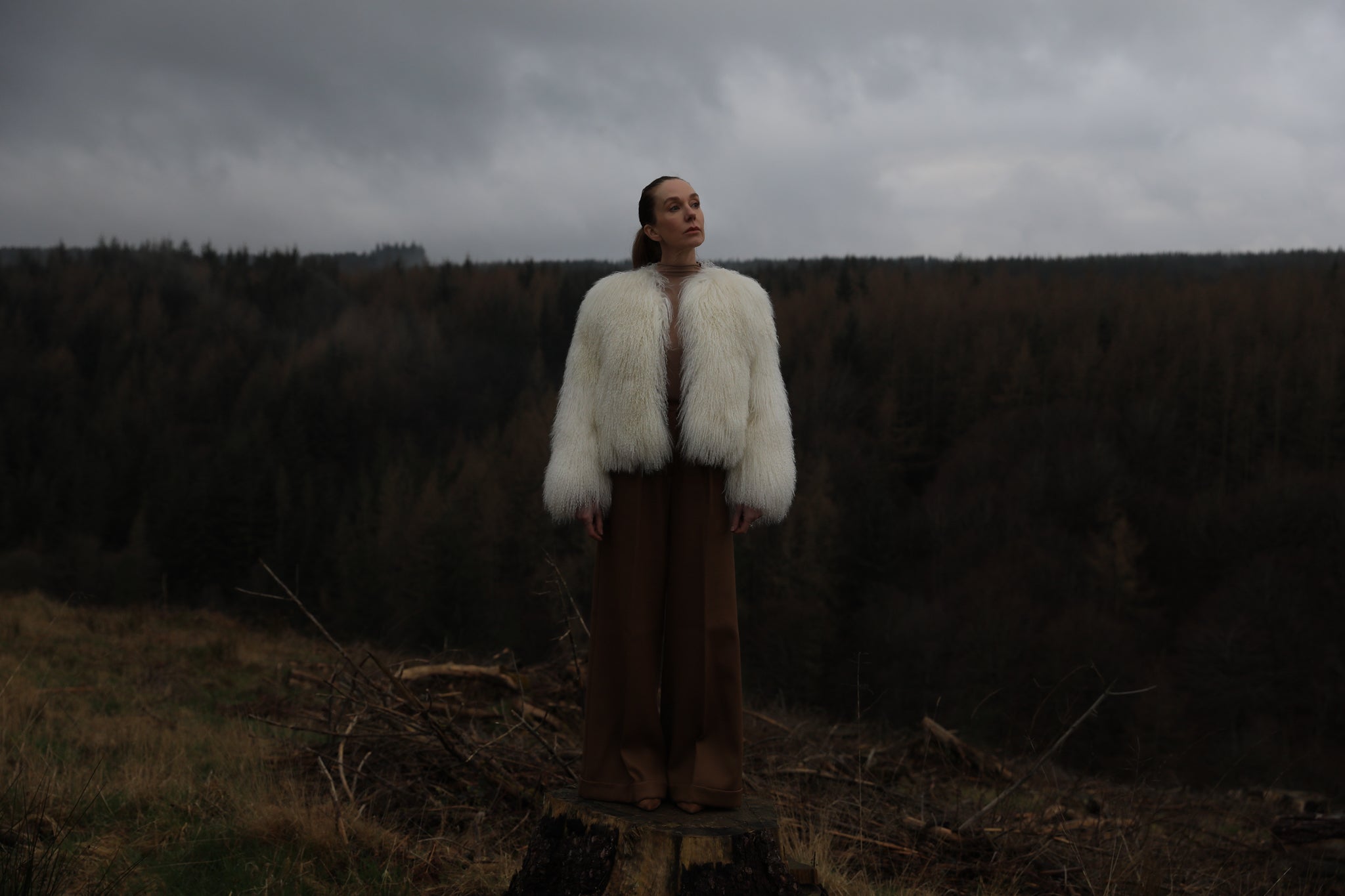 A luxurious white Mongolian fur coat from Josephine Jones, exuding elegance and sophistication, perfect for staying warm in style during the colder seasons.