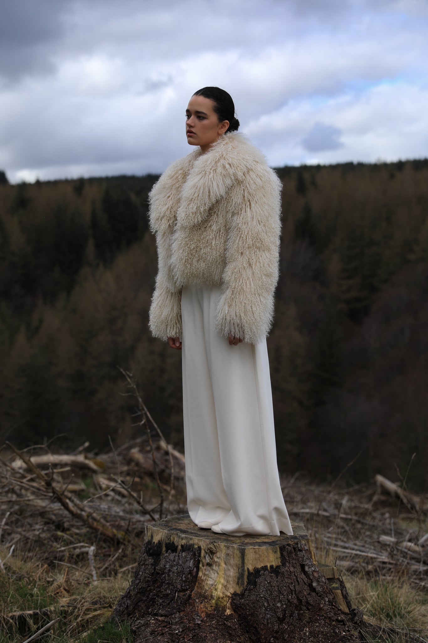 Ivory voluminous collar Mongolian fur coat from Josephine Jones - A timeless staple piece exuding elegance and sophistication, perfect for making a bold fashion statement.