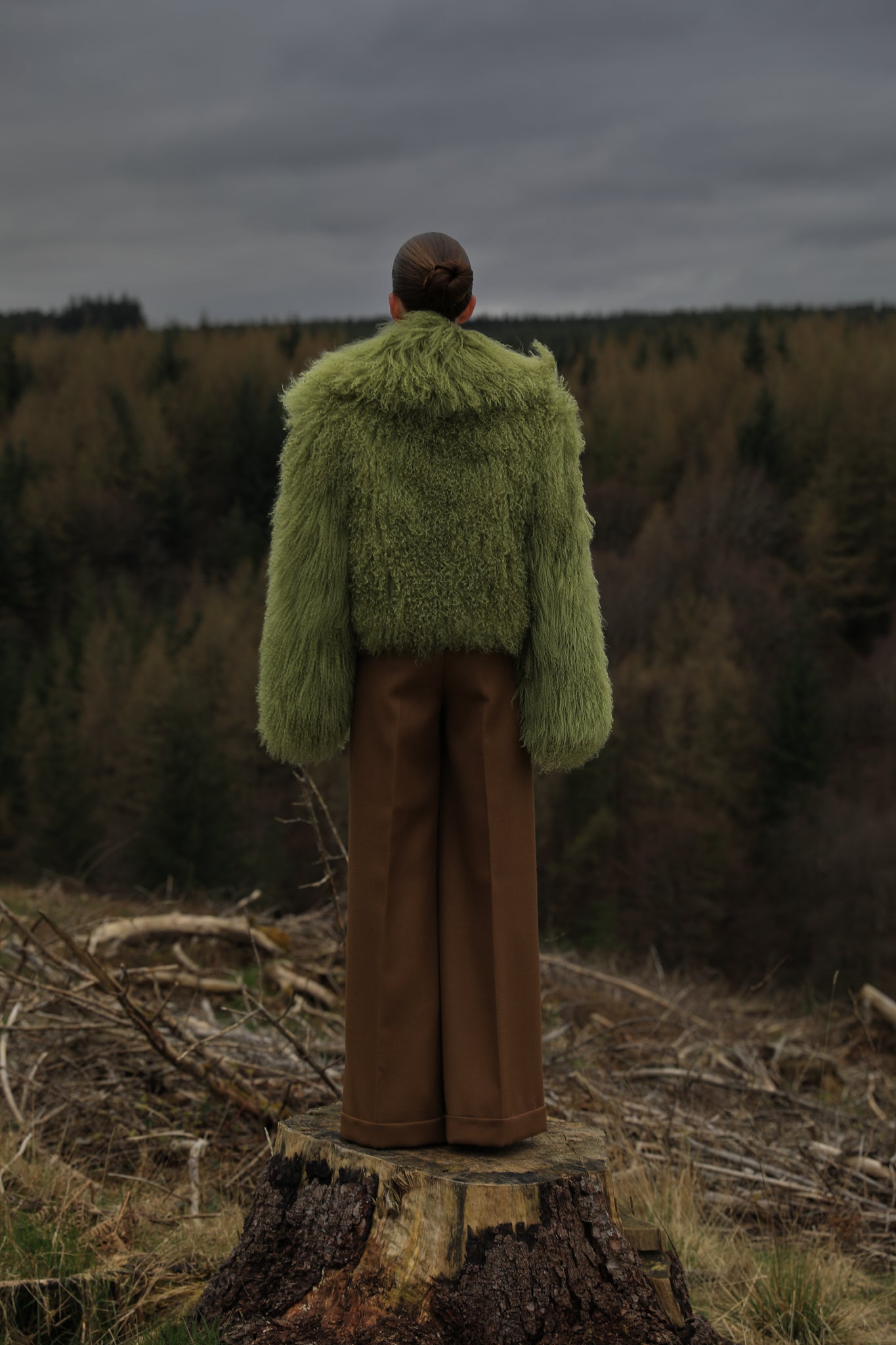 Olive voluminous collar Mongolian fur coat from Josephine Jones - A timeless staple piece exuding elegance and warmth, perfect for any occasion.