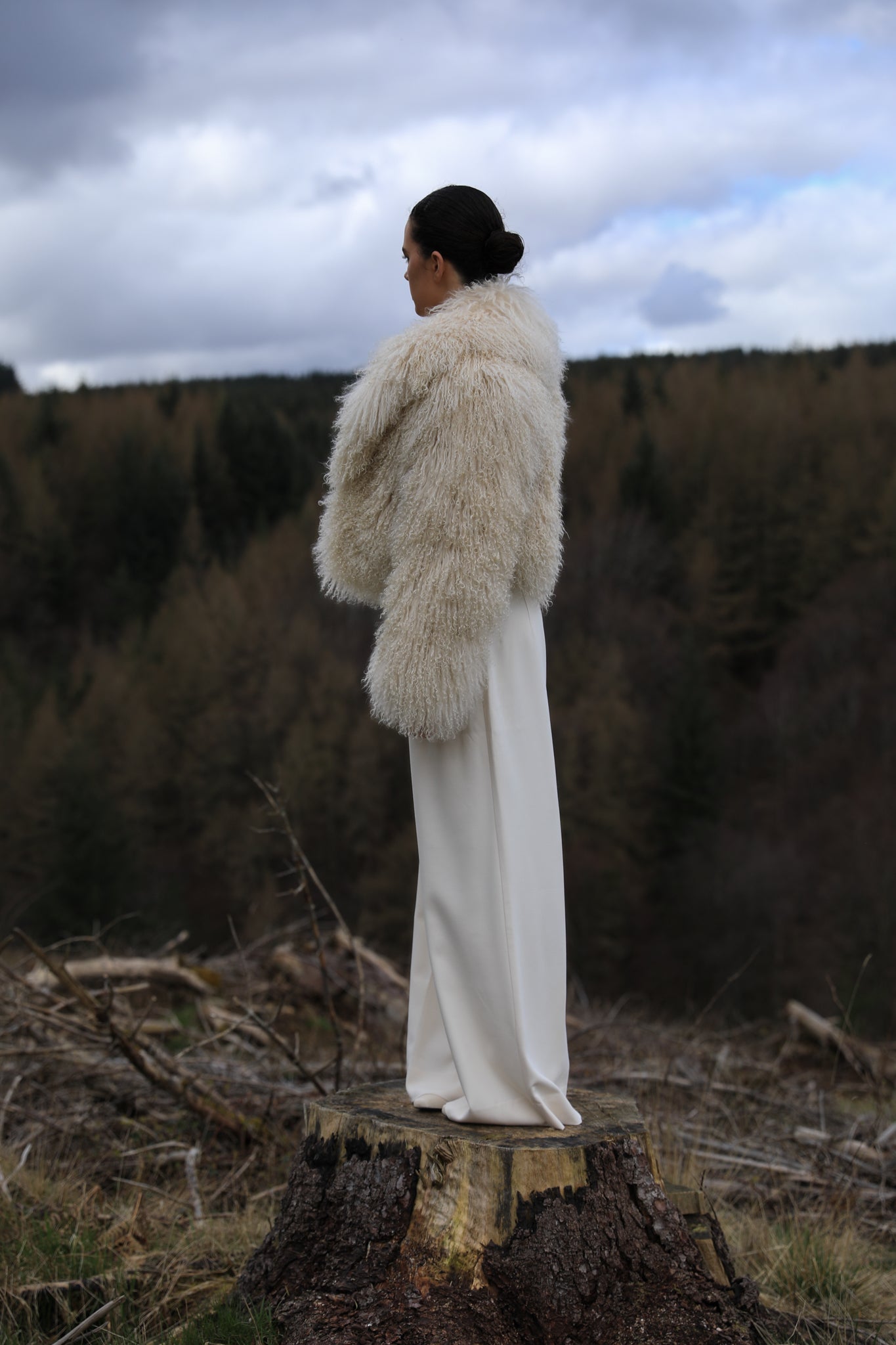 Ivory voluminous collar Mongolian fur coat from Josephine Jones - A timeless staple piece exuding elegance and sophistication, perfect for making a bold fashion statement.