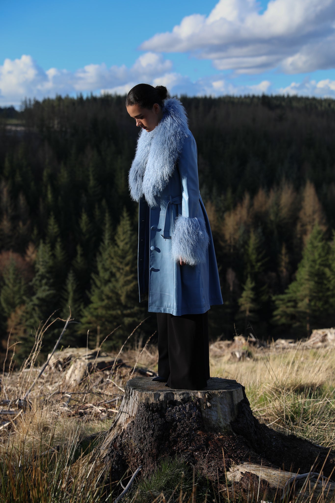 Josephine Jones Cornflower Blue Genuine Leather Trench Coat with Mongolian Fur Collar and Cuffs - Elevate your style with this luxurious trench coat featuring exquisite cornflower blue genuine leather and decadent Mongolian fur accents on the collar and cuffs.