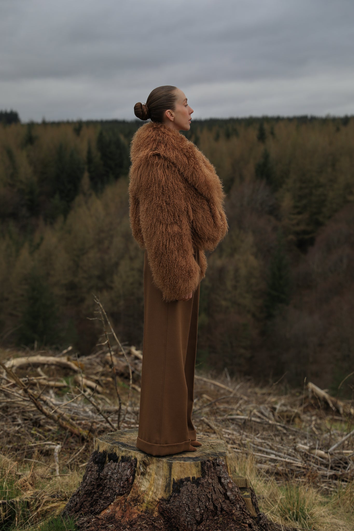 A stunning tobacco-colored voluminous collar Mongolian fur coat from Josephine Jones, the epitome of timeless elegance and luxury fashion