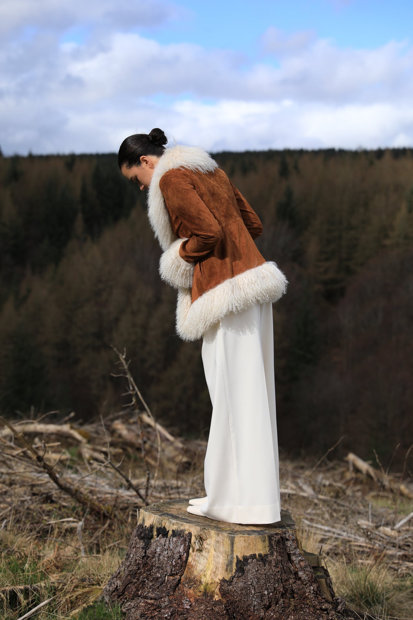 Josephine Jones tan suede Afghan Penny Lane style jacket with ivory Mongolian fur trims. A timeless classic in genuine suede, exuding elegance and warmth.