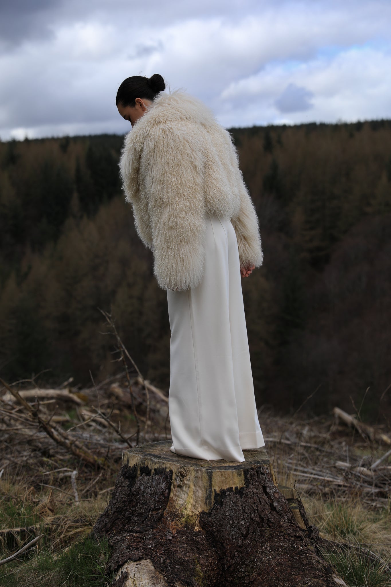 Ivory voluminous collar Mongolian fur coat from Josephine Jones - A timeless staple piece exuding elegance and sophistication, perfect for making a bold fashion statement.