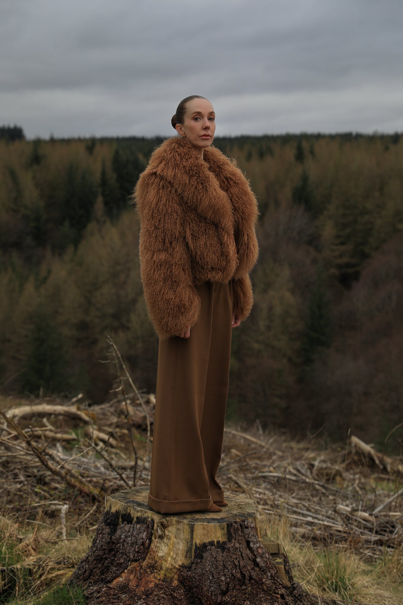 A stunning tobacco-colored voluminous collar Mongolian fur coat from Josephine Jones, the epitome of timeless elegance and luxury fashion