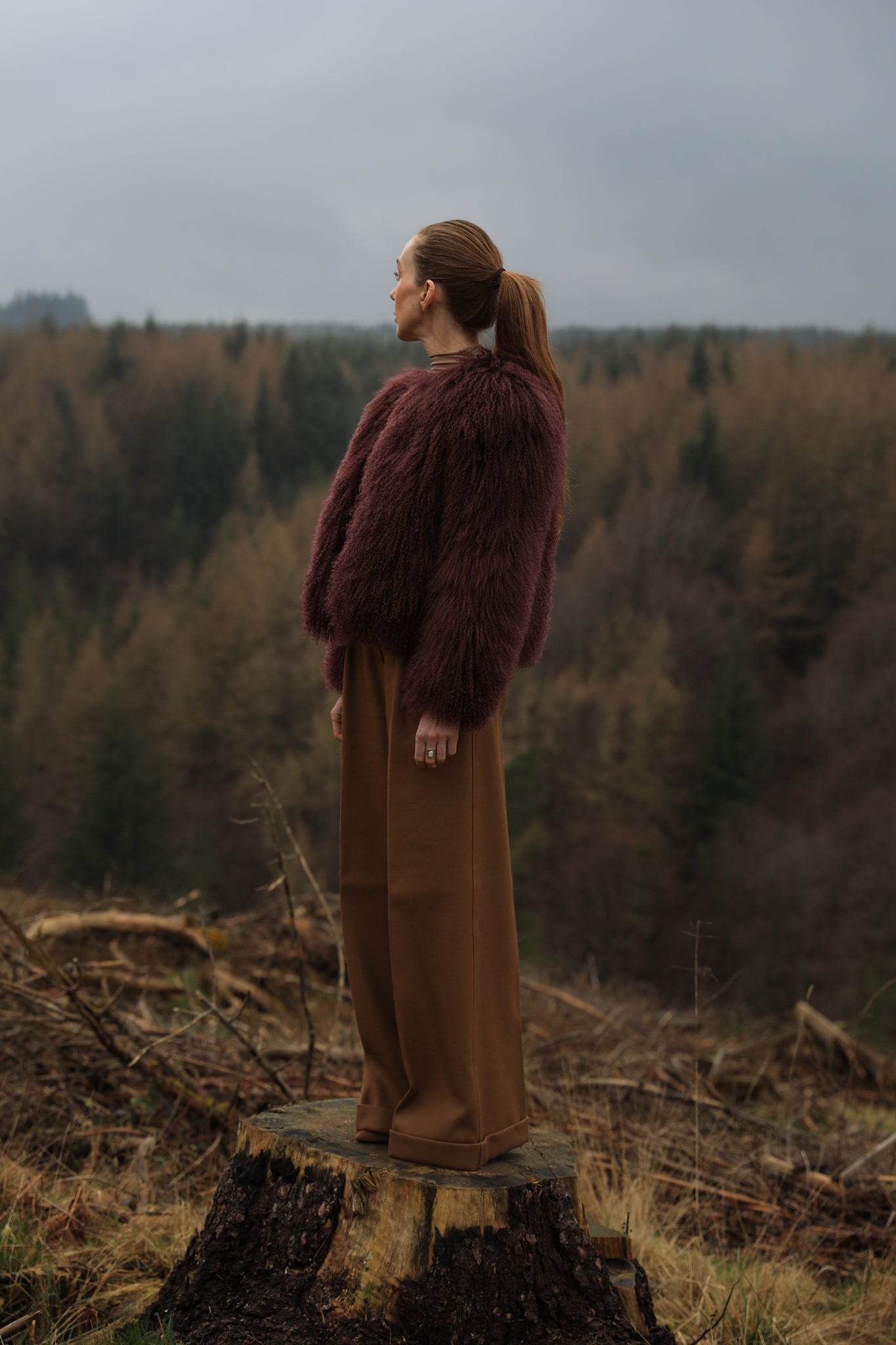 A sumptuous burgundy Mongolian fur coat from Josephine Jones, exuding elegance and luxury.