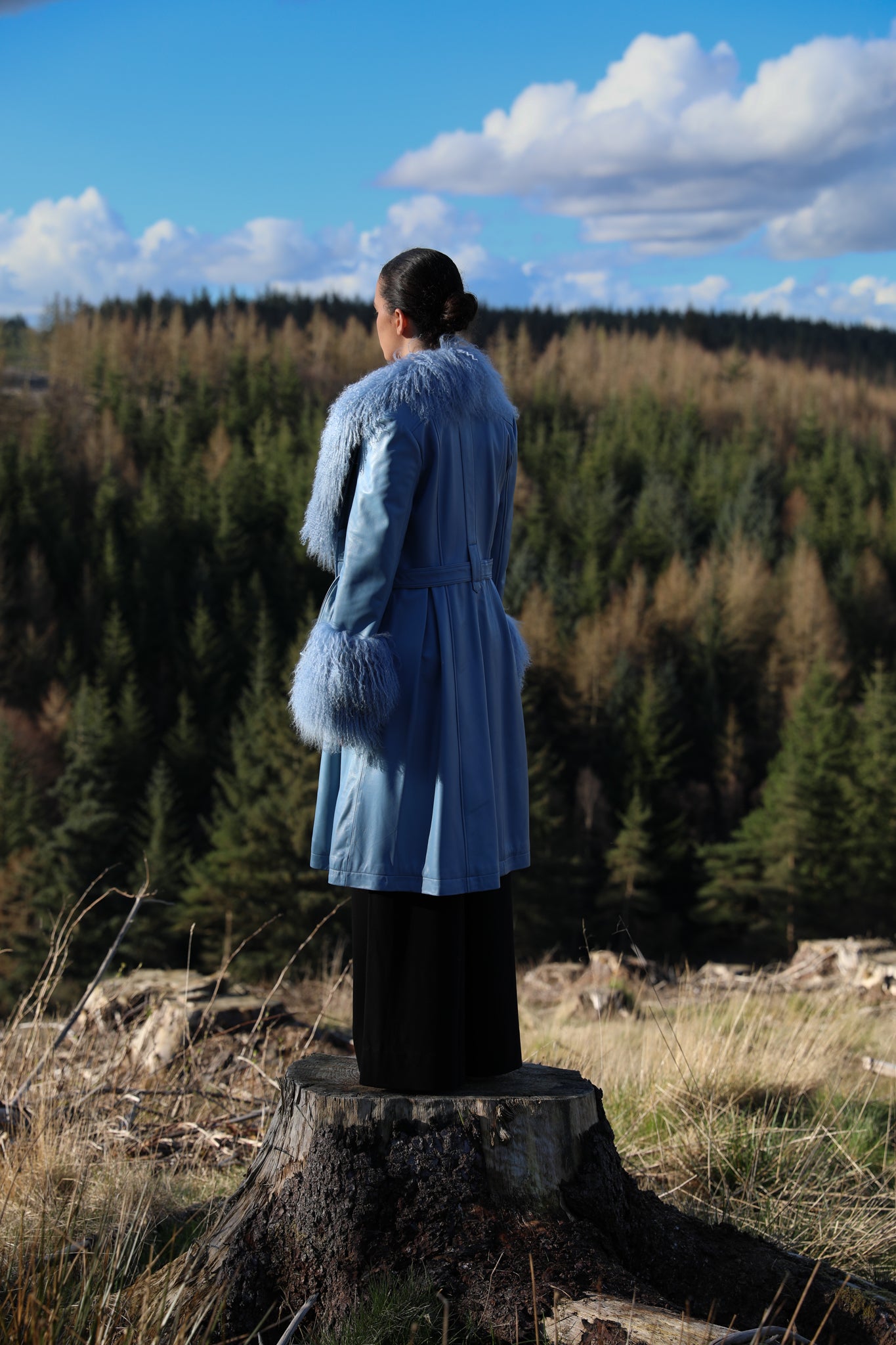 Josephine Jones Cornflower Blue Genuine Leather Trench Coat with Mongolian Fur Collar and Cuffs - Elevate your style with this luxurious trench coat featuring exquisite cornflower blue genuine leather and decadent Mongolian fur accents on the collar and cuffs.