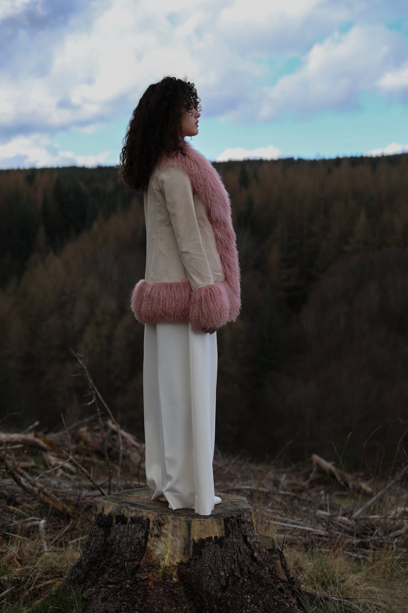 Ivory suede afghan-style jacket with blush Mongolian fur trims by Josephine Jones, epitomizing classic Penny Lane style. Luxurious genuine suede adds texture and sophistication to your wardrobe.